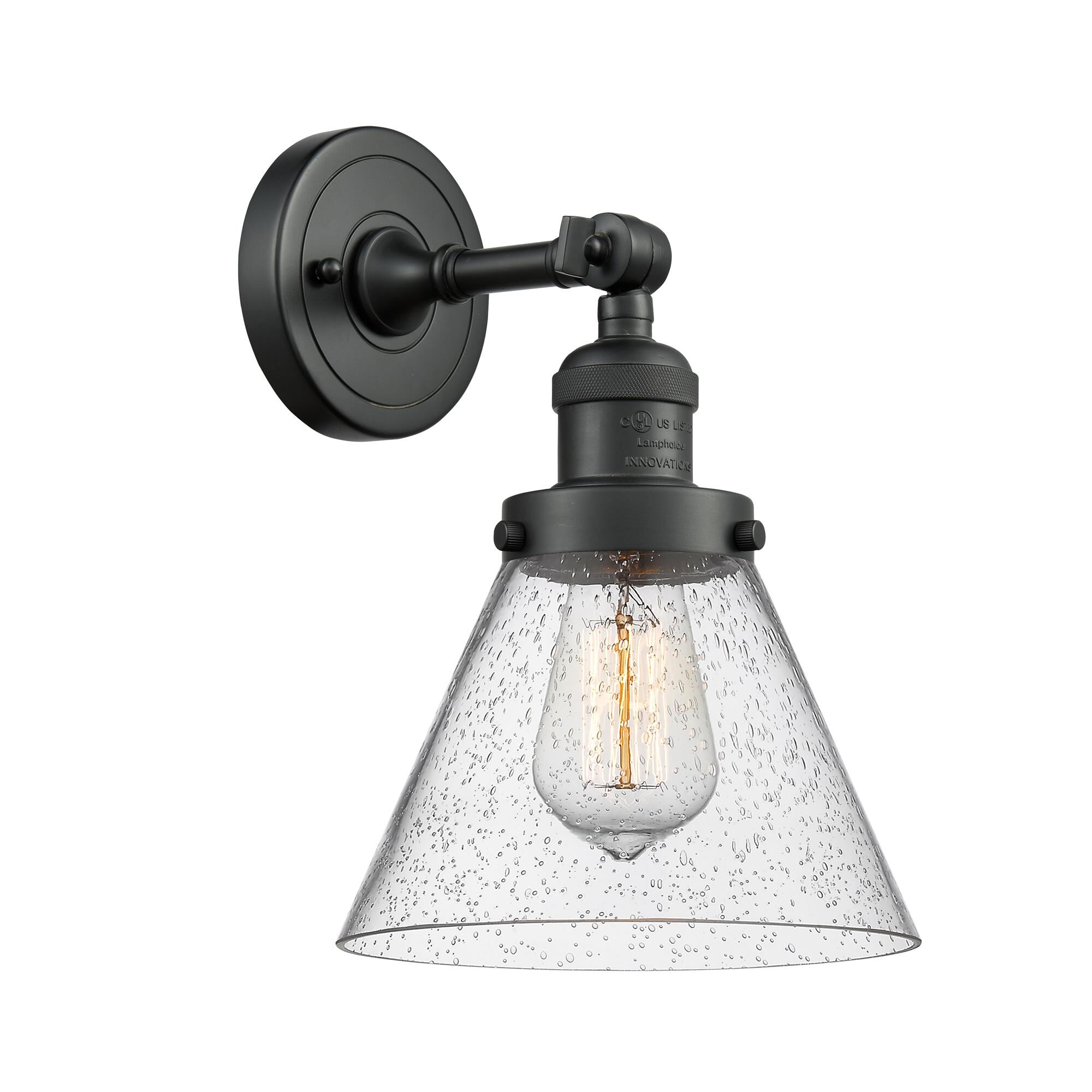 Shown in Matte Black finish and Seedy glass and Brushed Satin Nickel shade and No Accent accent