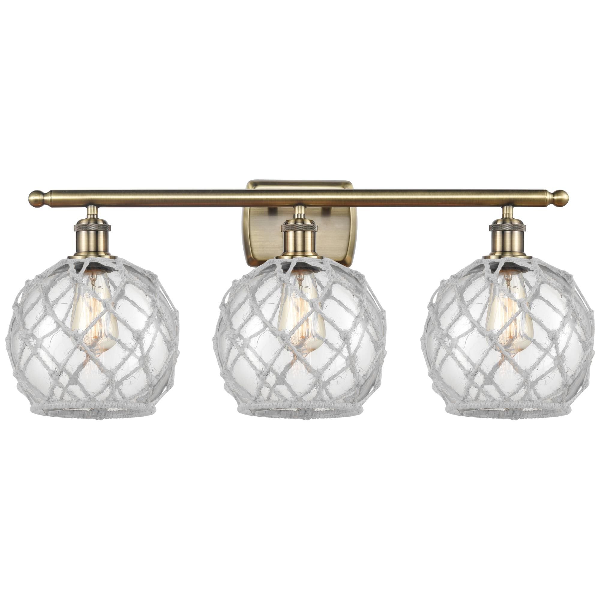 Shown in Antique Brass finish and Clear with White Rope glass