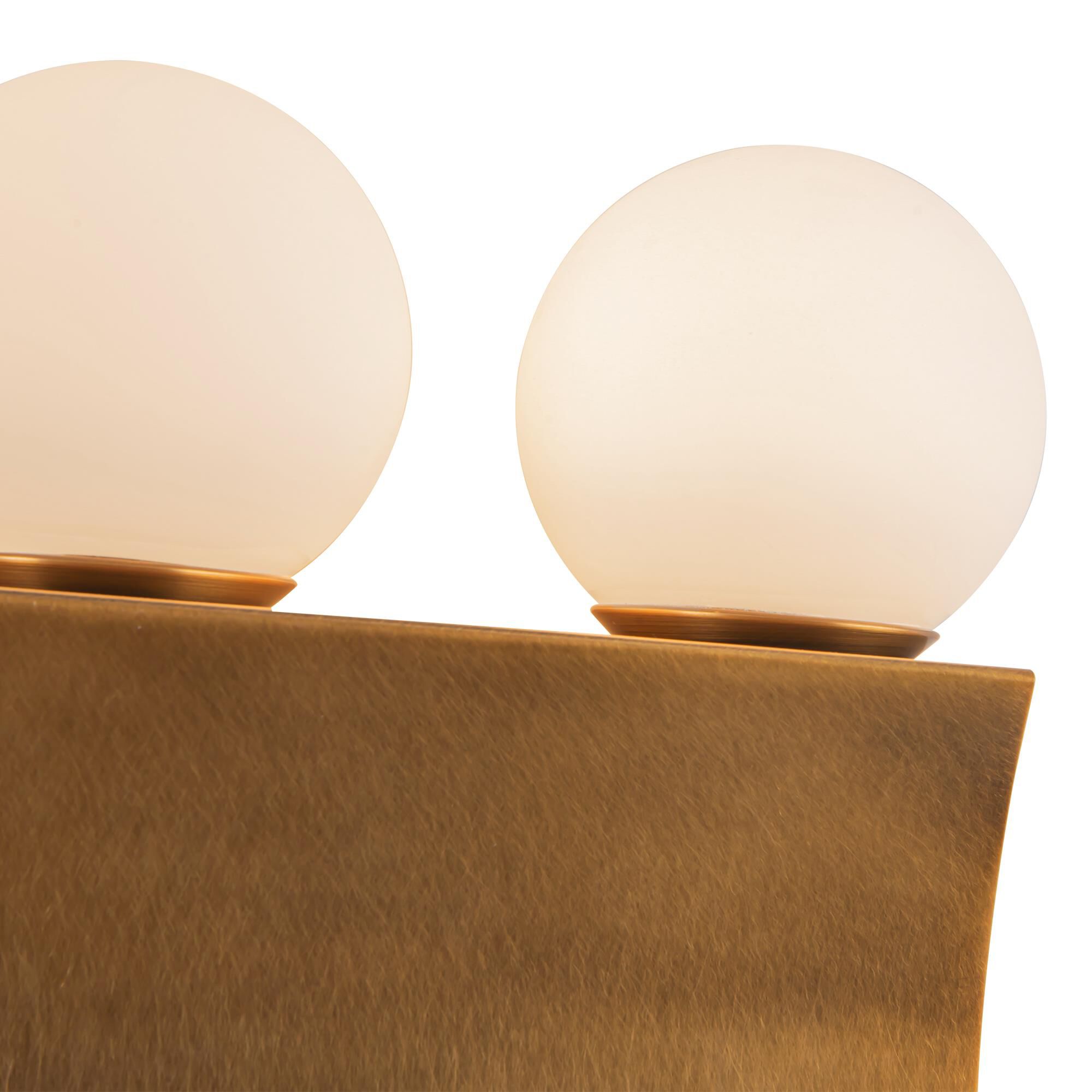 Shown in Vintage Brass finish and Opal glass
