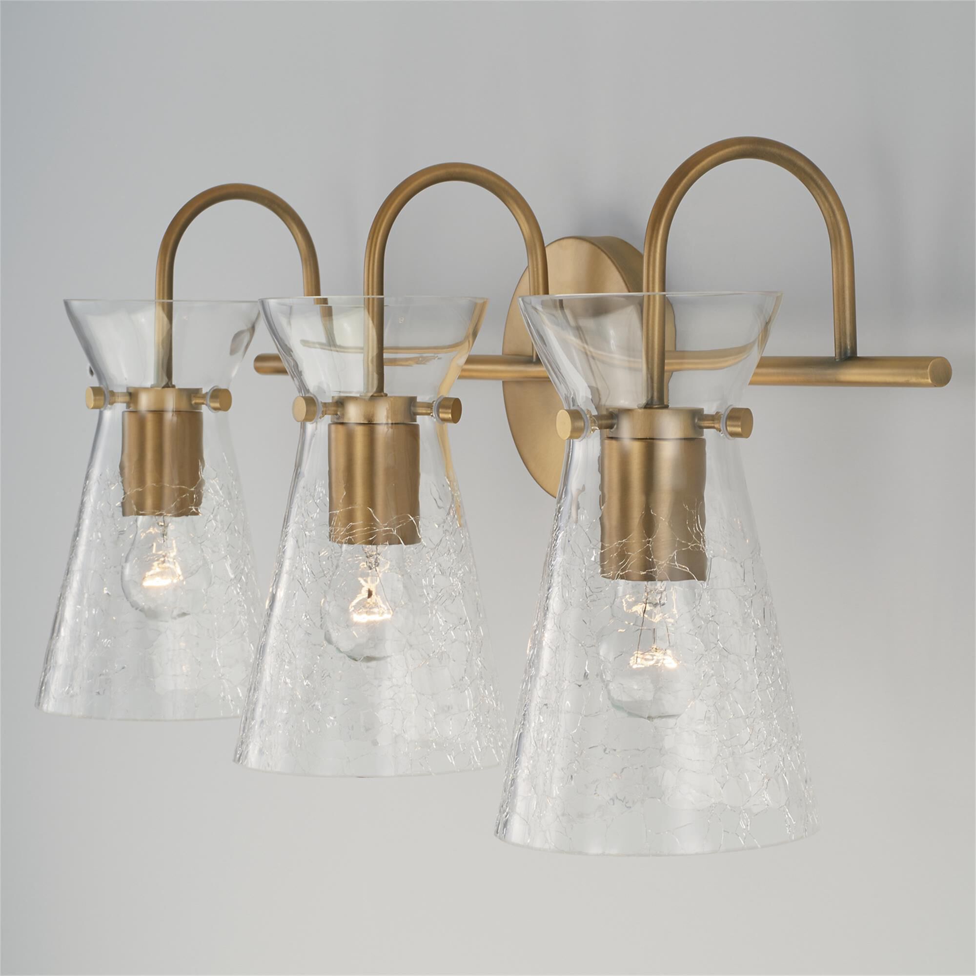 Shown in Aged Brass finish and Clear Half-Crackle glass