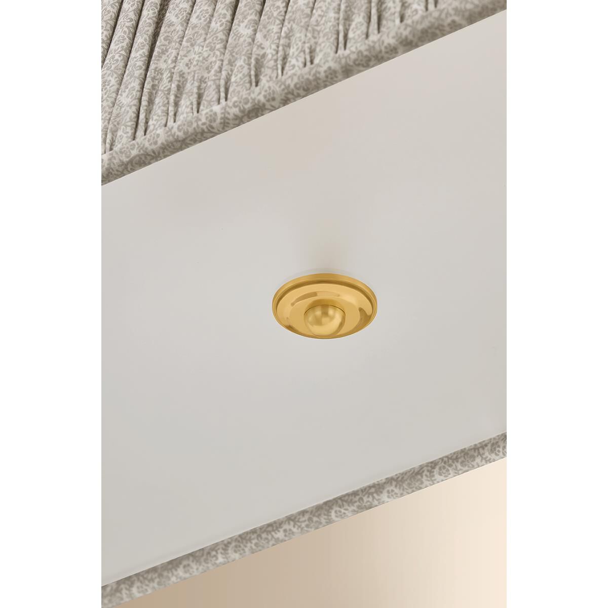 Shown in Aged Brass finish and Gathered Printed Cotton shade