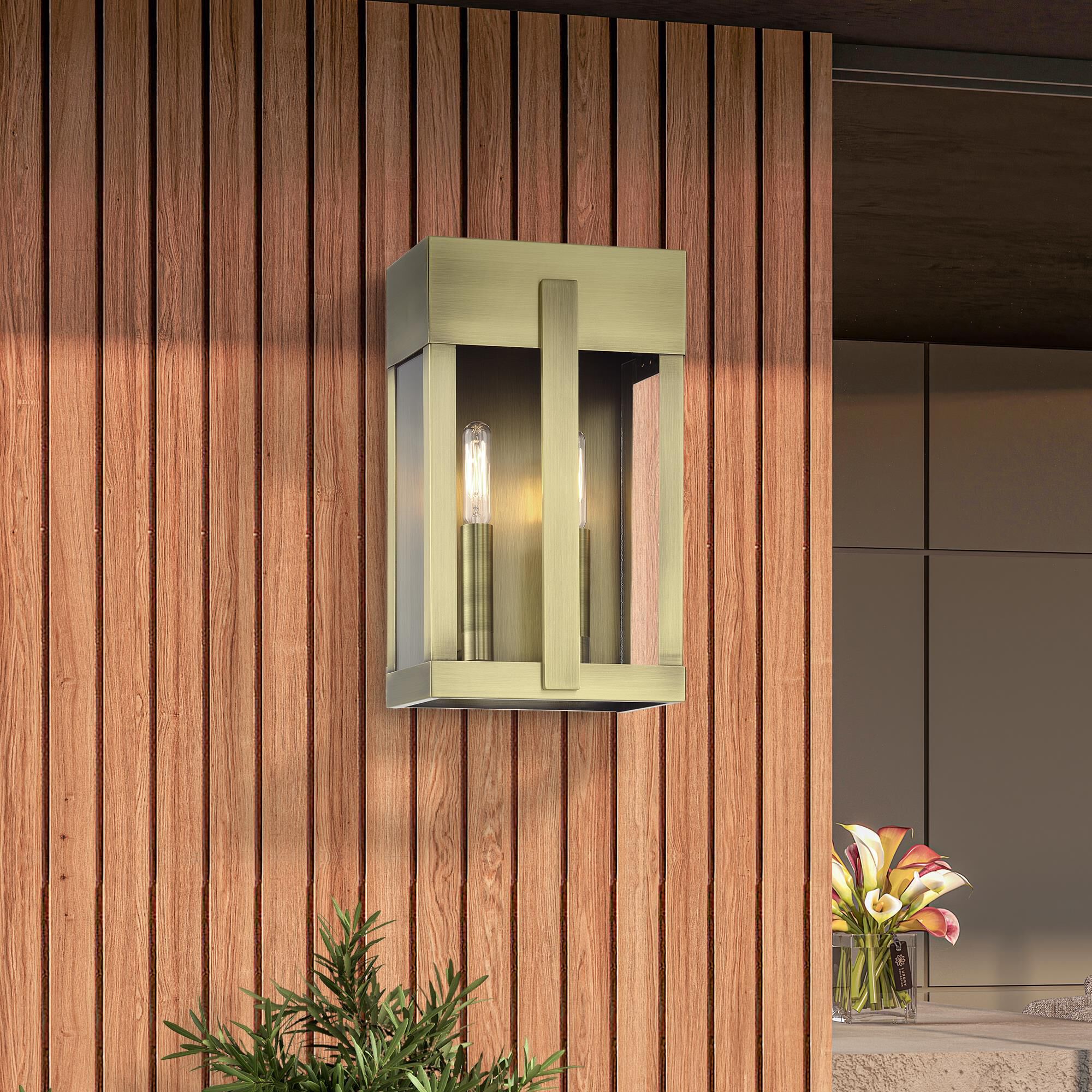 Shown in Antique Brass finish and Clear glass