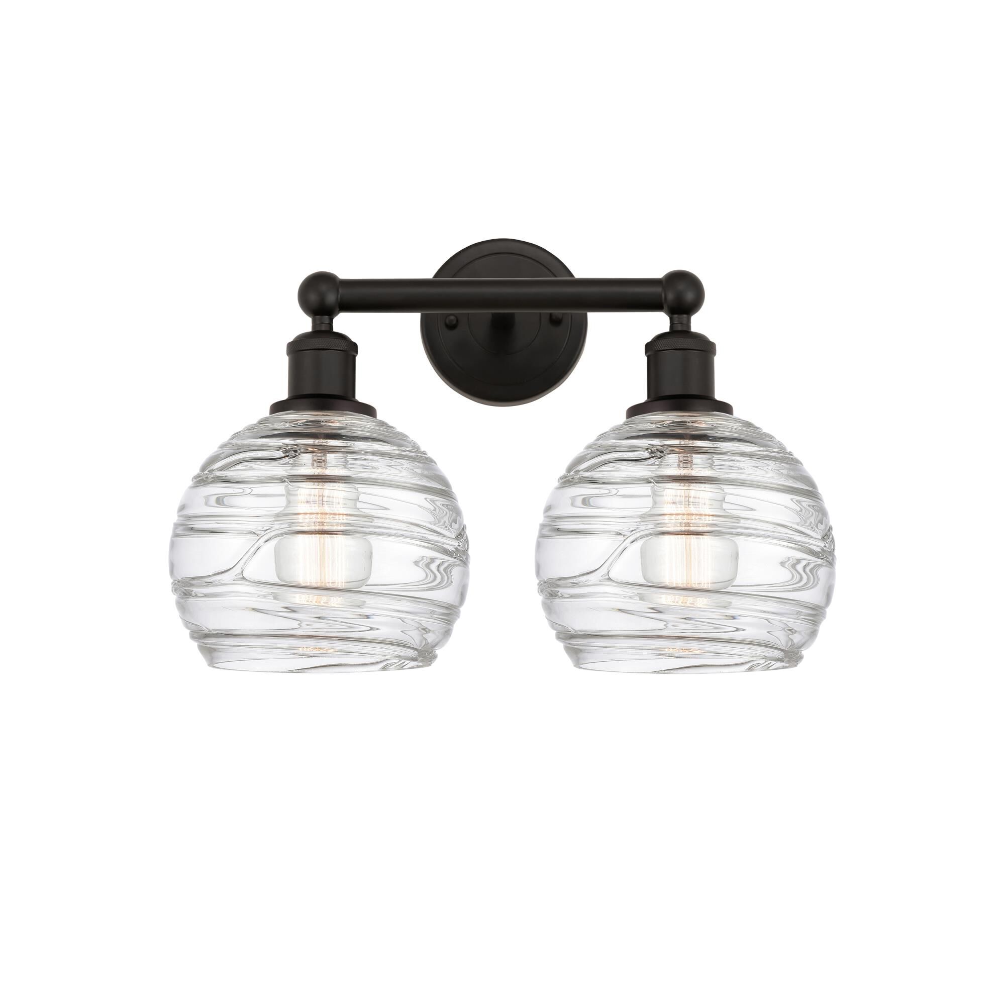 Shown in Oil Rubbed Bronze finish and Clear Deco Swirl glass