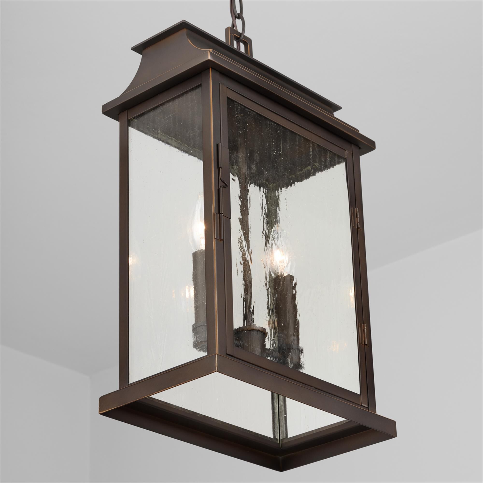 Shown in Oiled Bronze finish and Antiqued glass