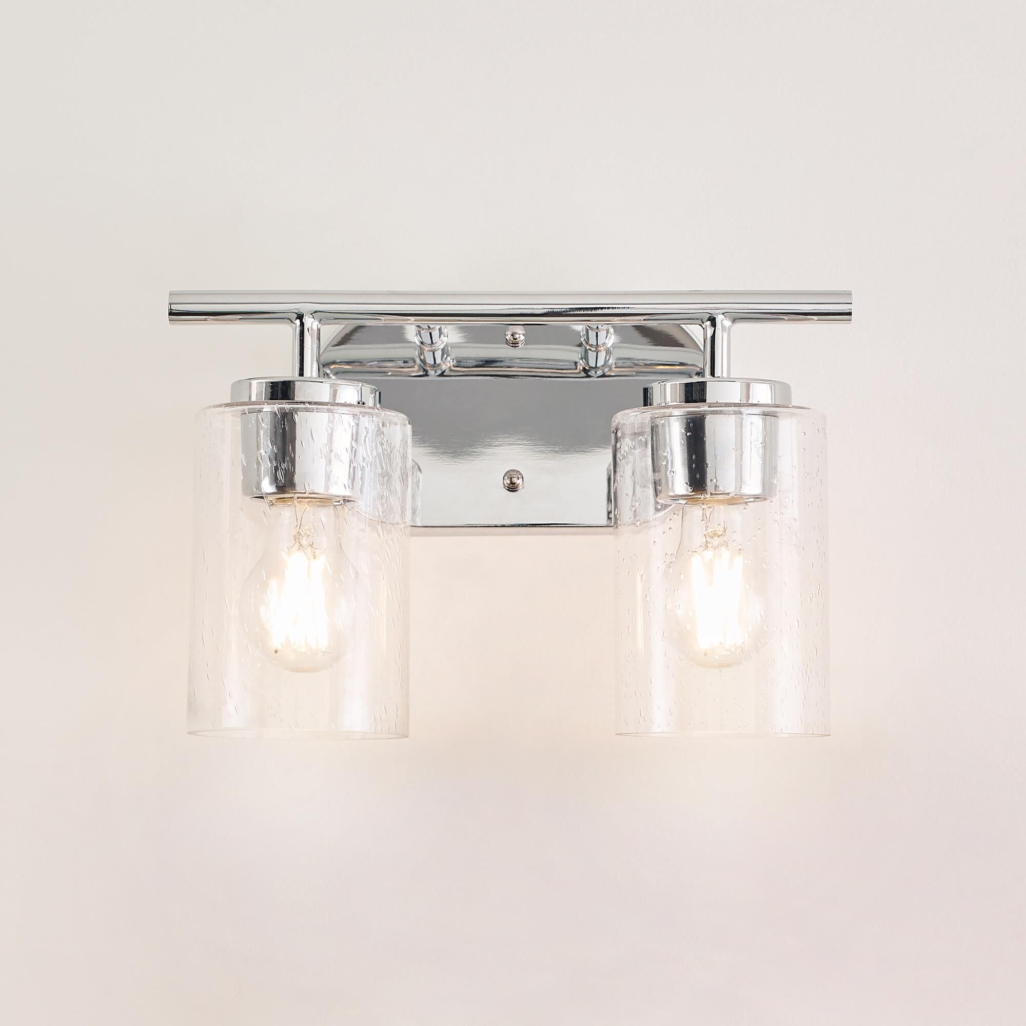 Shown in Chrome finish and Clear Seeded glass