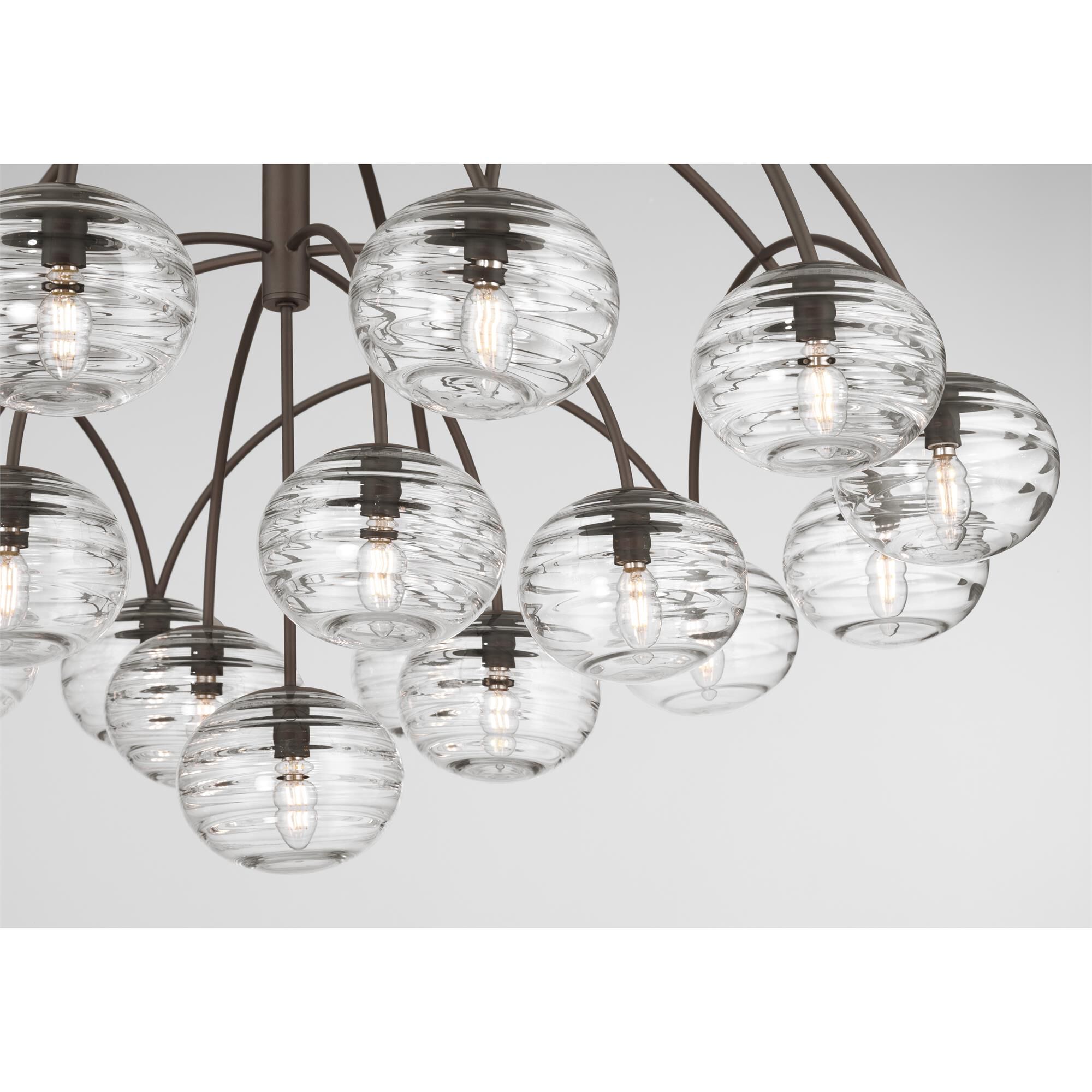 Shown in Dark Bronze finish and Clear Ribbed glass