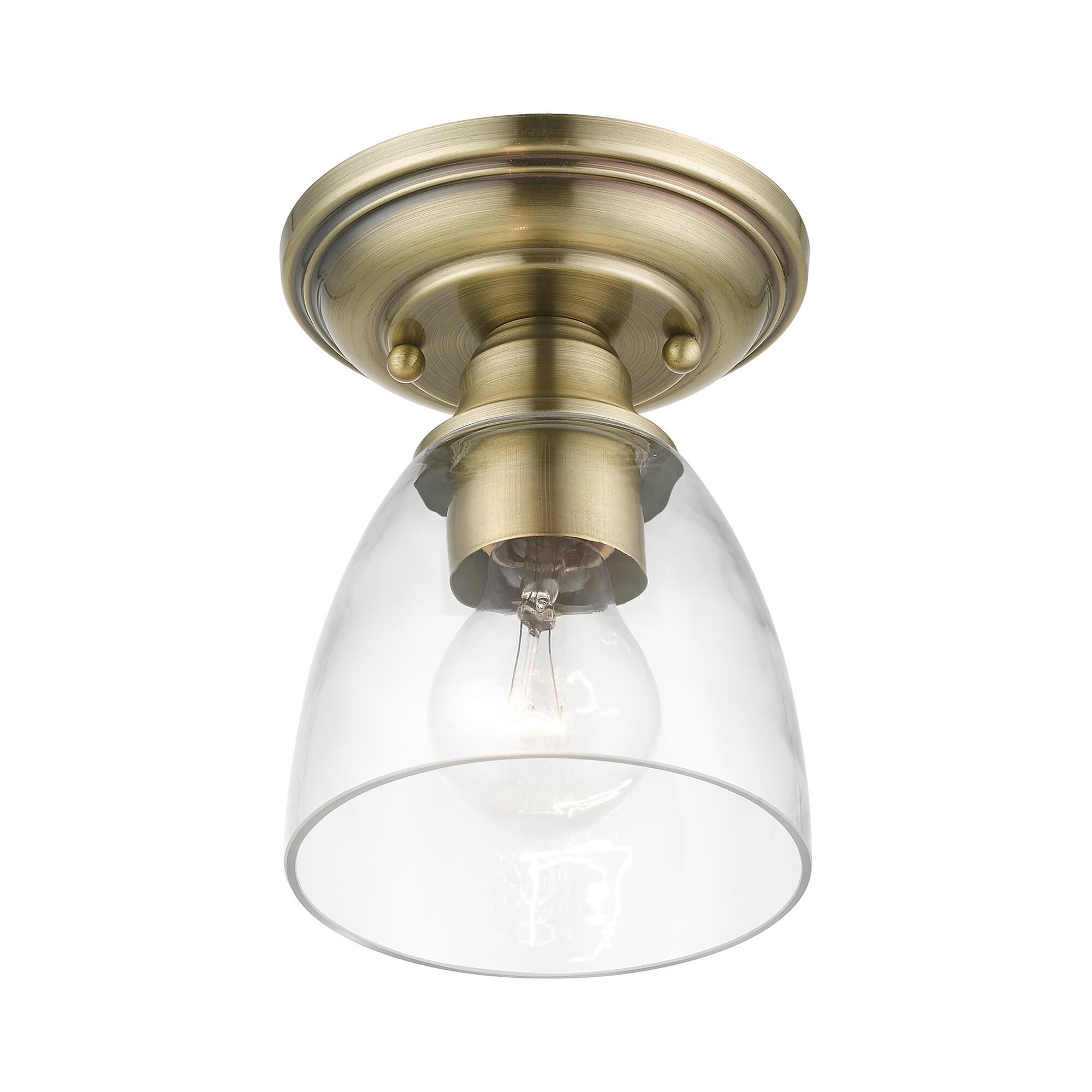 Shown in Antique Brass finish and Hand Blown Clear glass