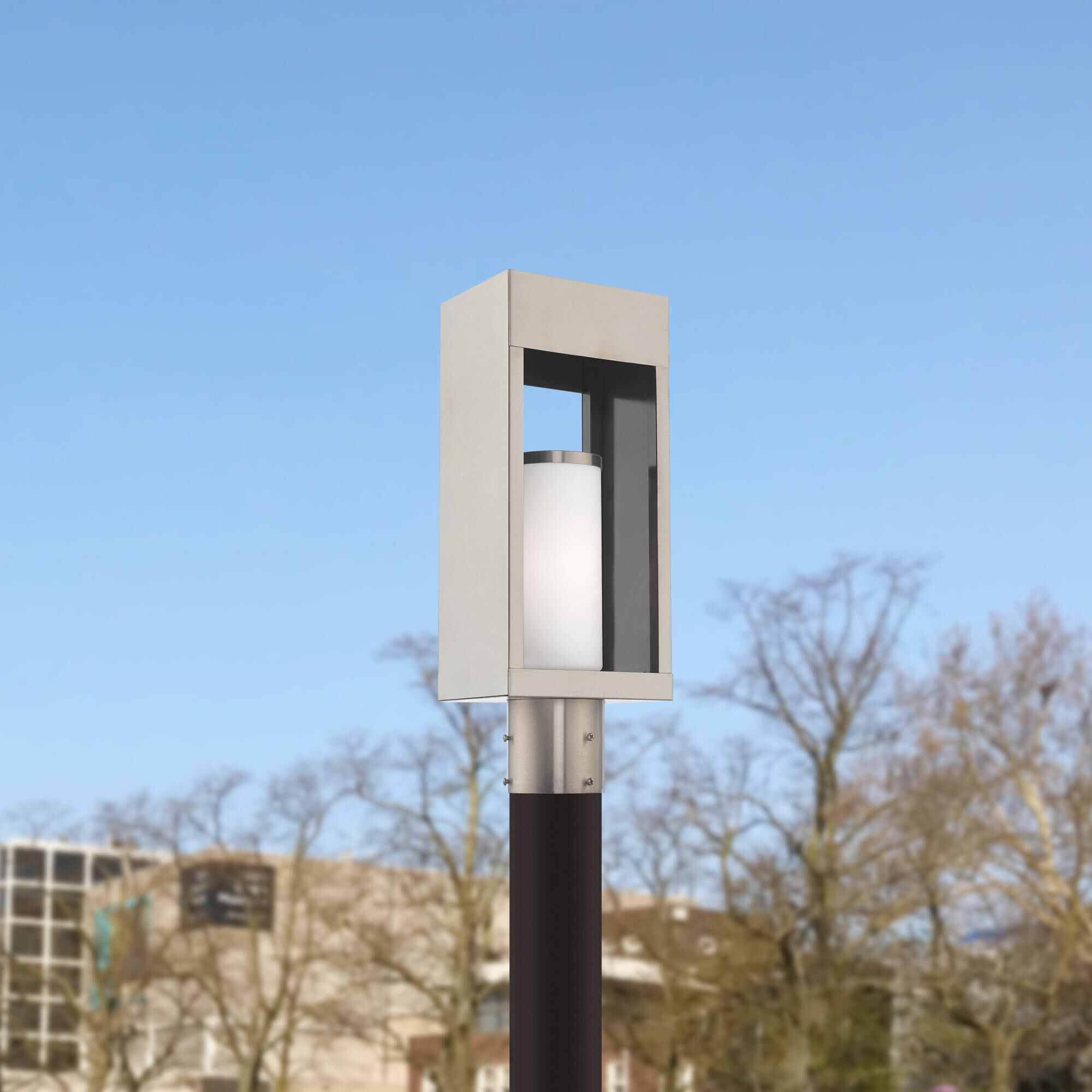 Shown in Brushed Nickel finish and Hand Blown Satin Opal White Cylinder glass