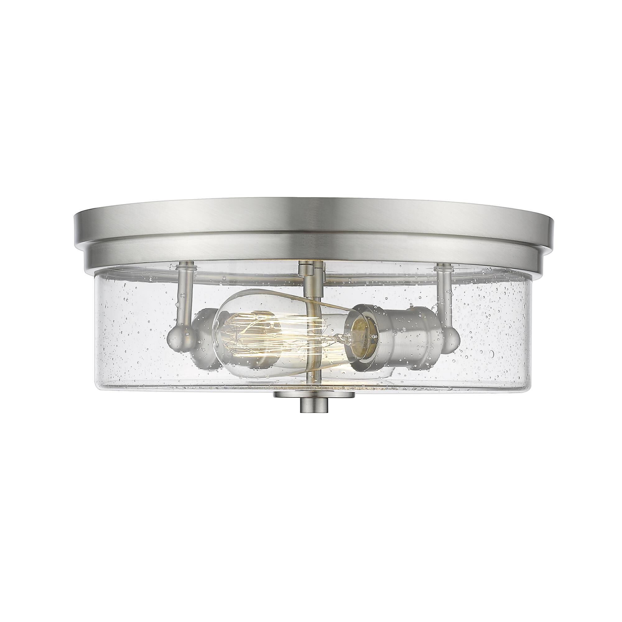 Shown in Brushed Nickel finish and Glass shade