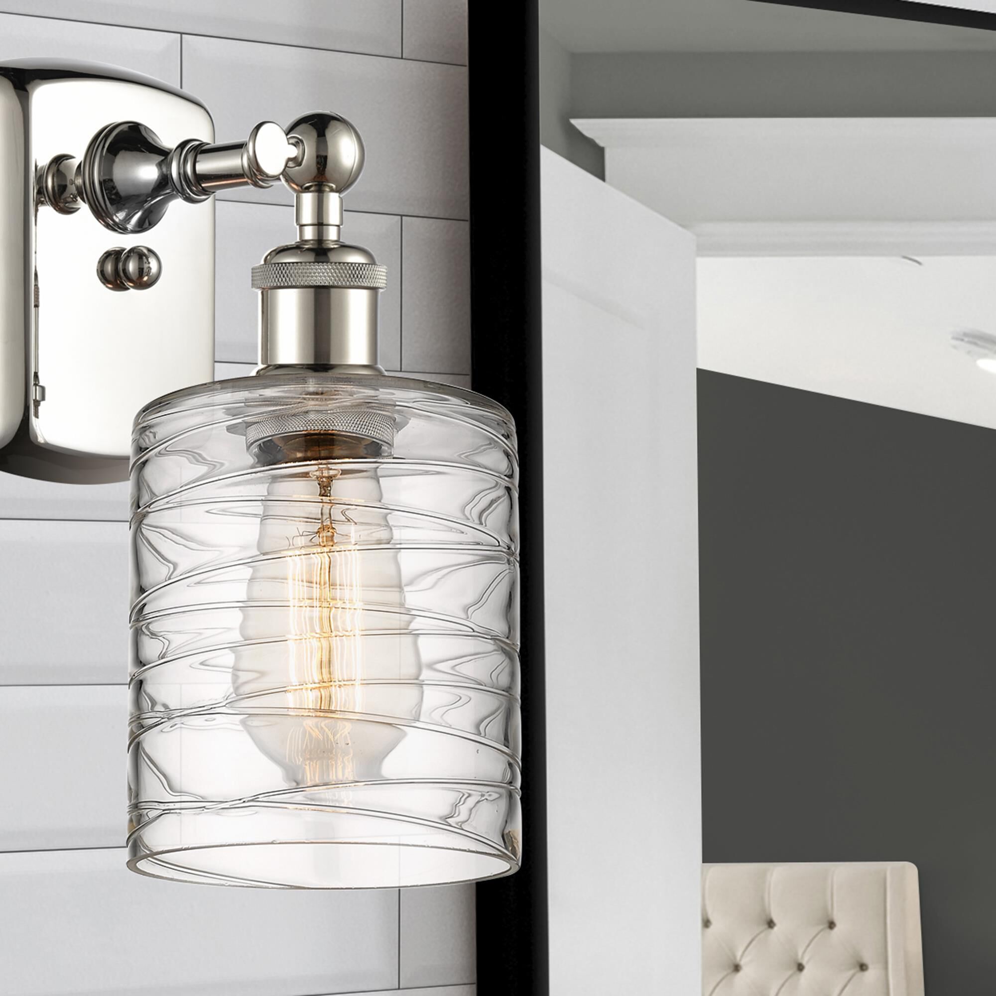 Shown in Polished Nickel finish and Deco Swirl glass