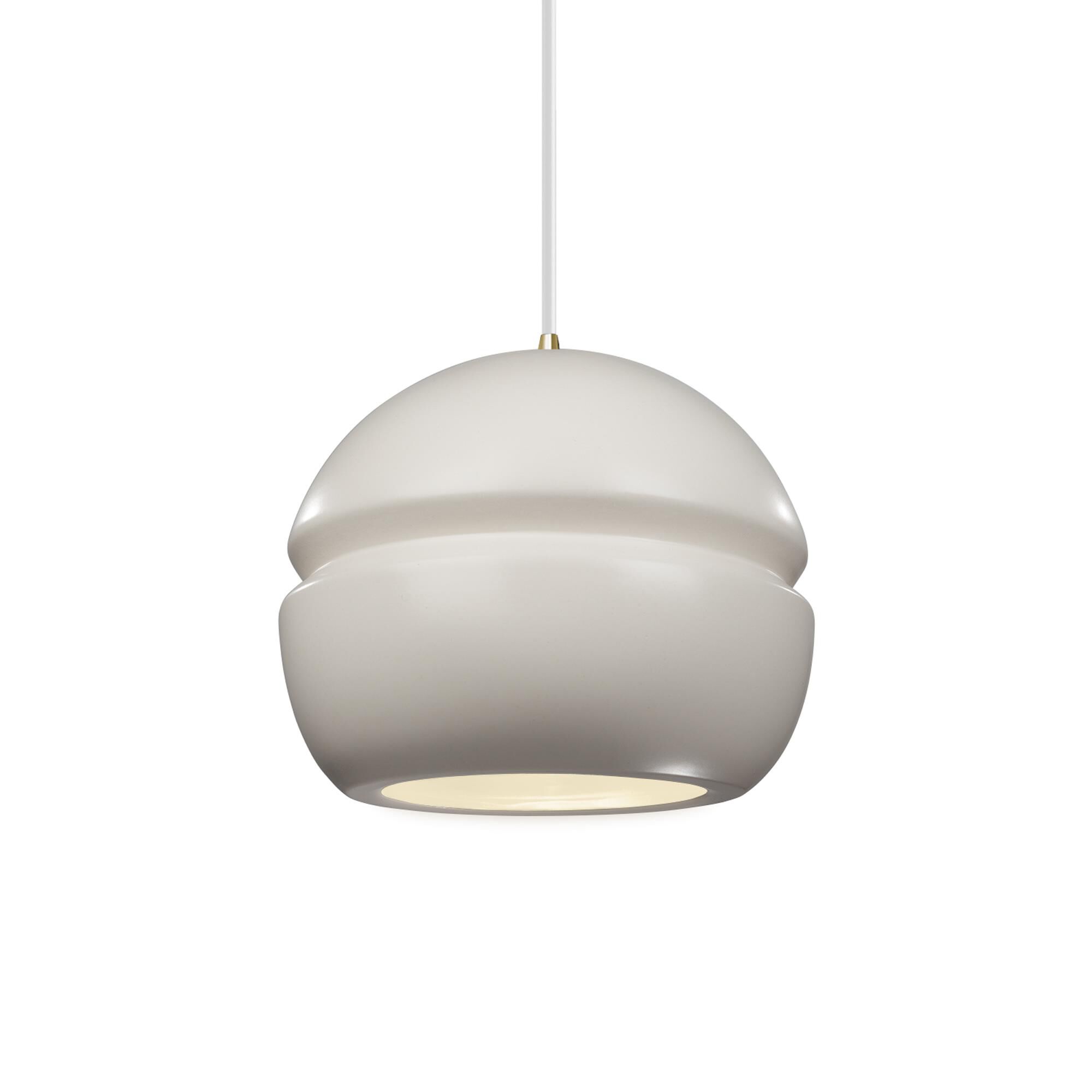 Shown in Antique Brass finish and Matte White Ceramic shade