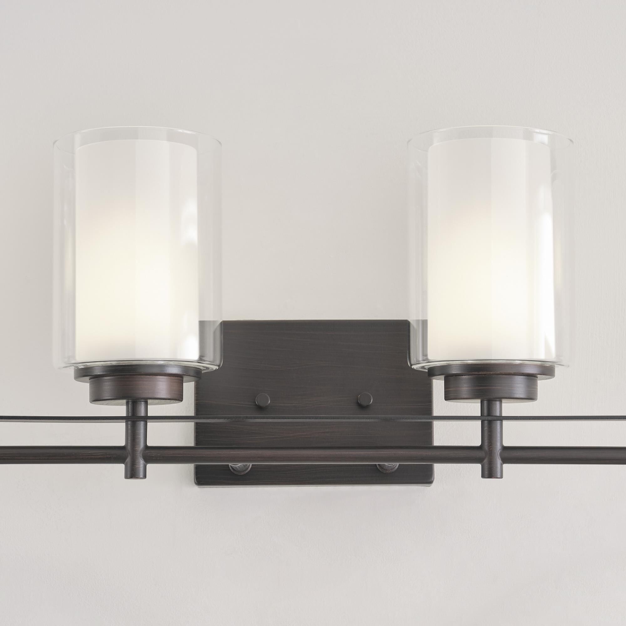 Shown in Bronze finish and Satin Etched and Clear glass