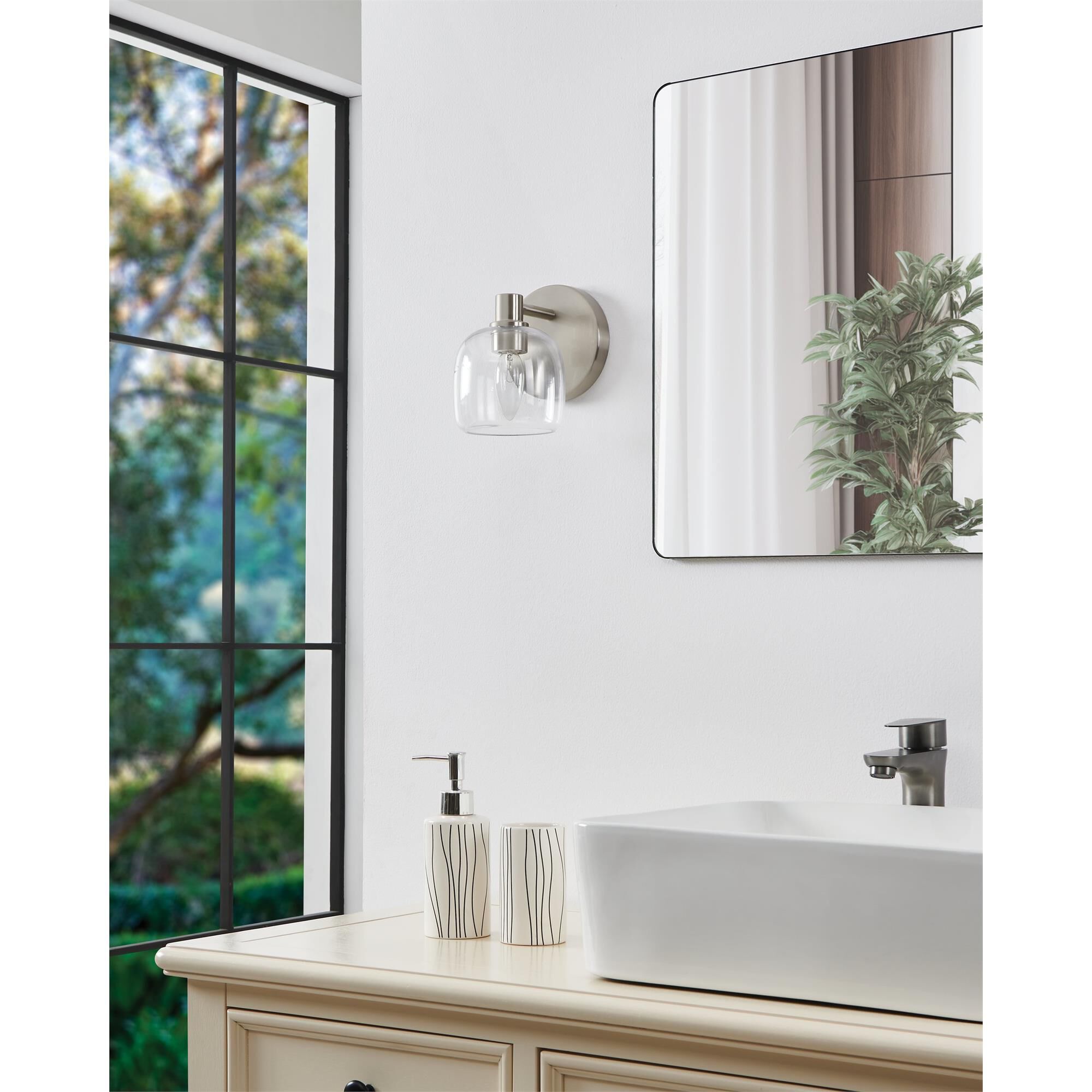 Shown in Brushed Nickel finish and Clear glass