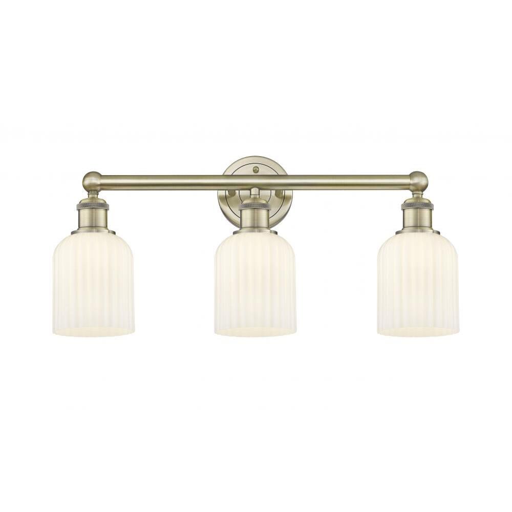 Shown in Antique Brass finish and Gloss White glass