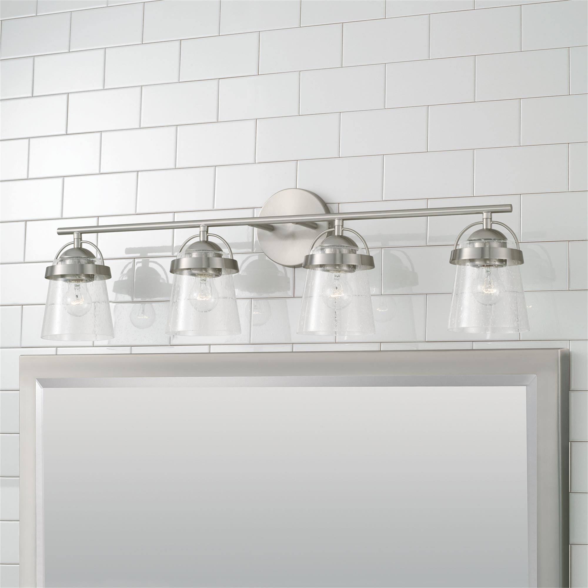 Shown in Brushed Nickel finish and Clear Seeded glass