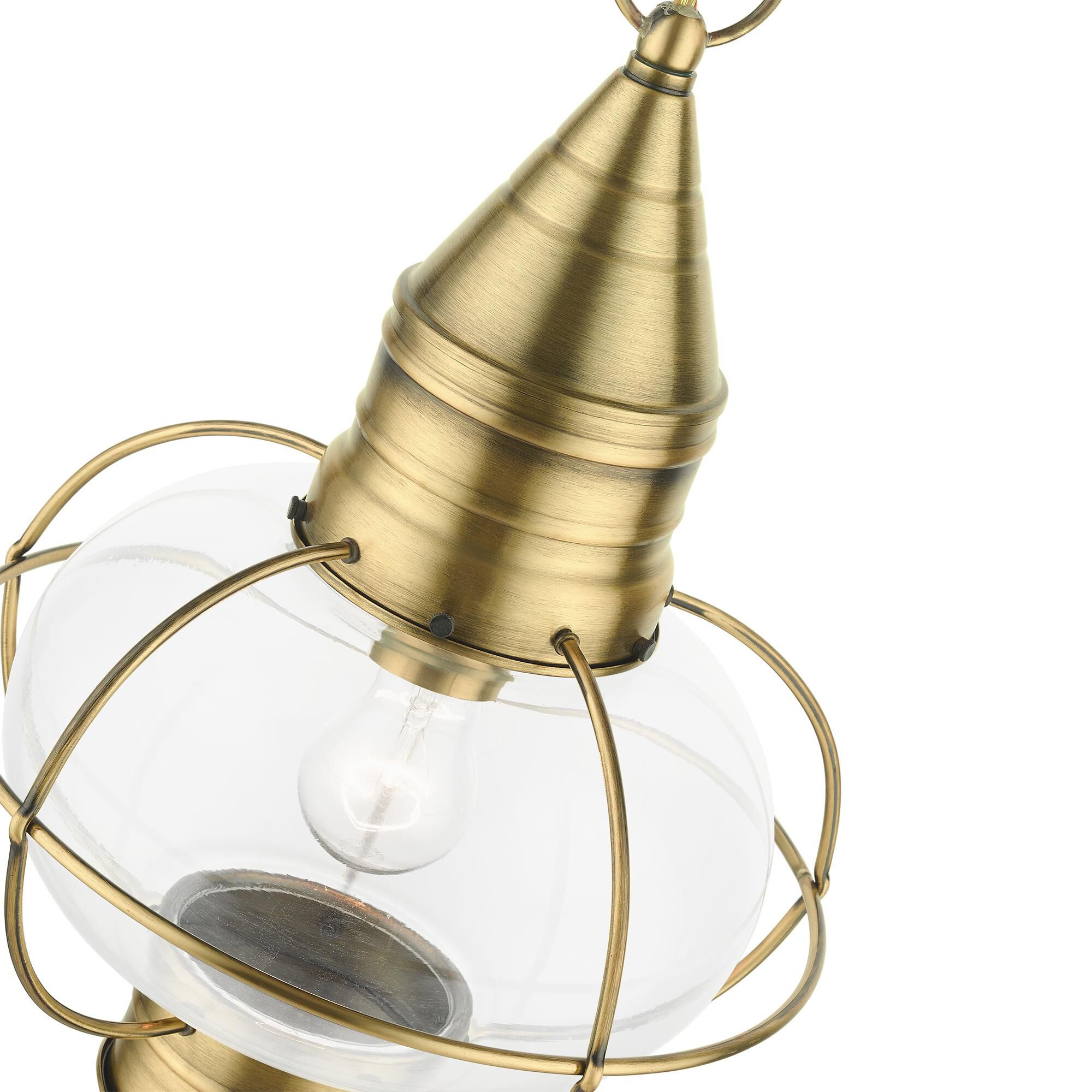Shown in Antique Brass finish and Hand Blown Clear glass