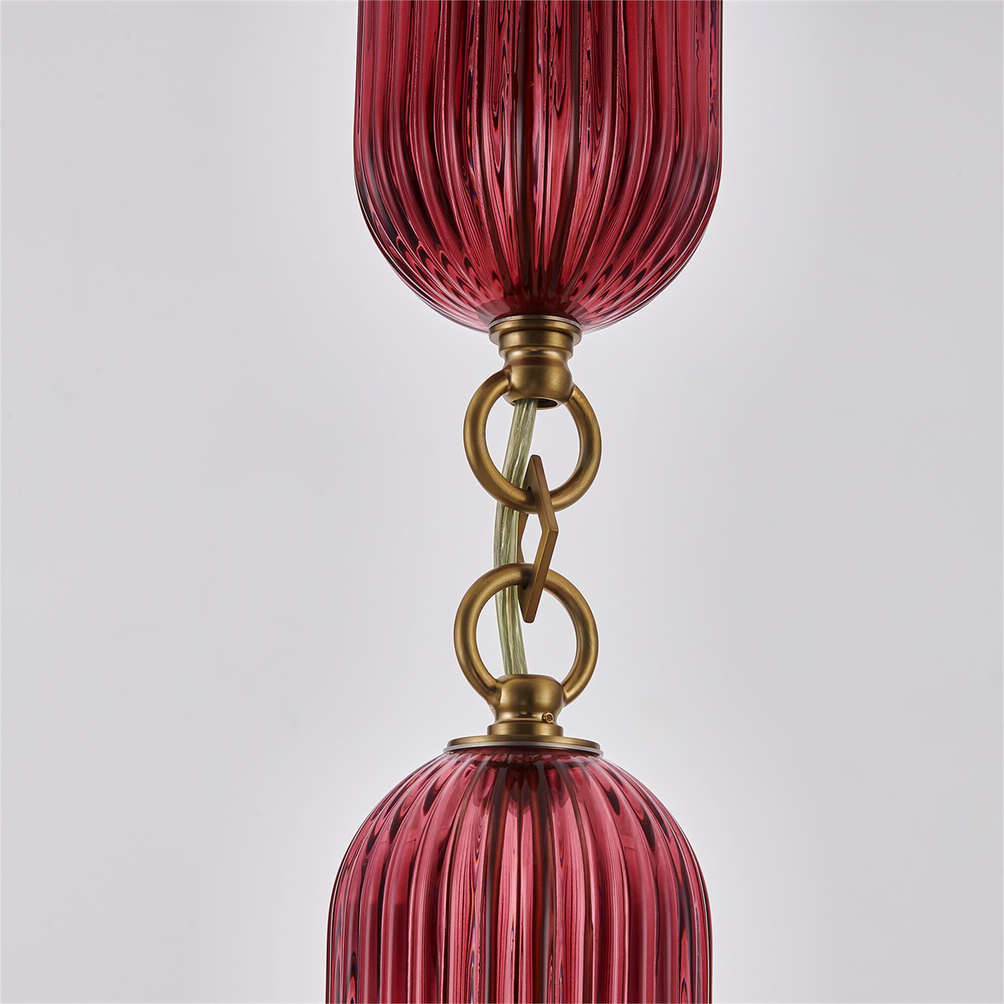 Shown in Satin Brass finish and Peacock Green glass
