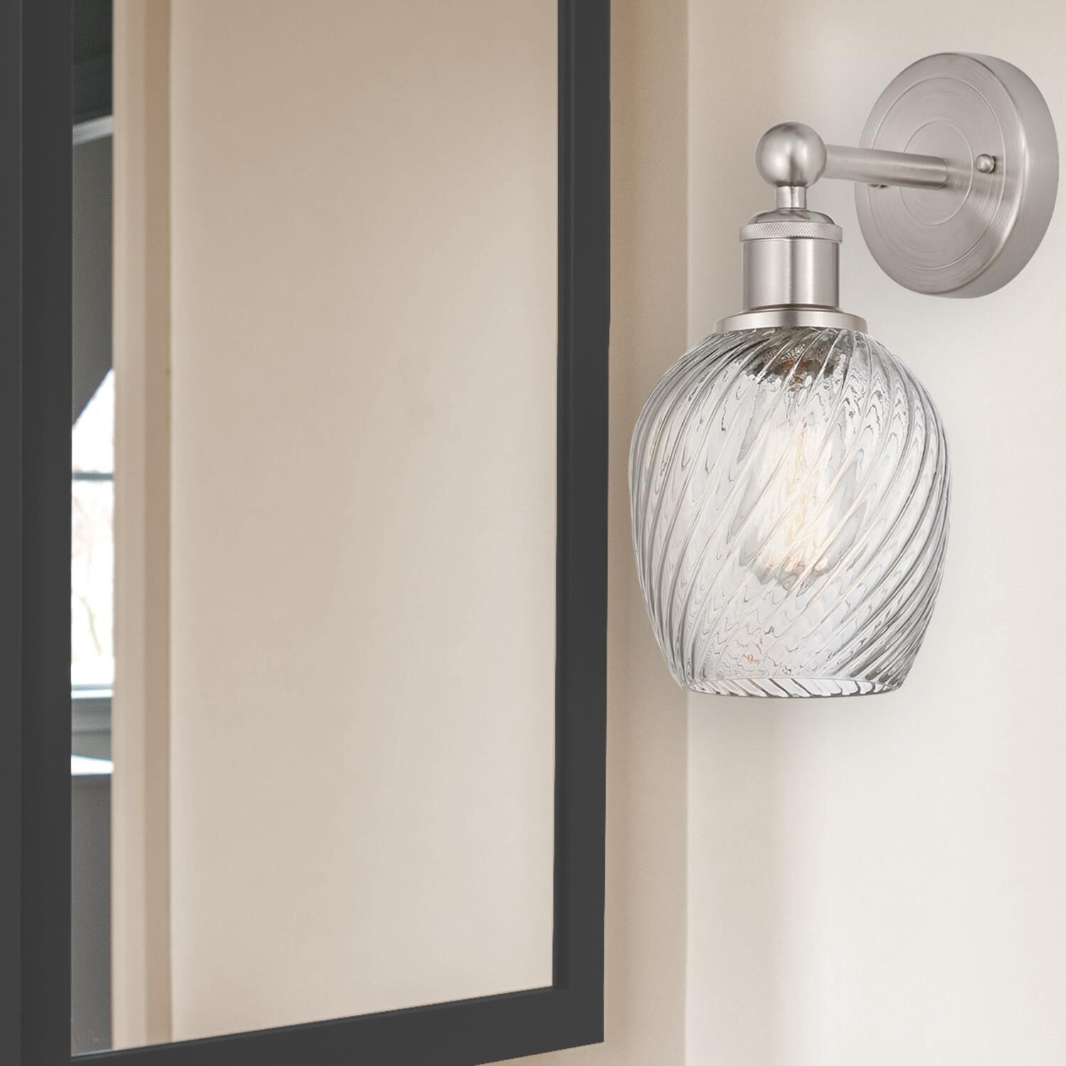 Shown in Brushed Satin Nickel  finish and Clear Spiral Fluted glass