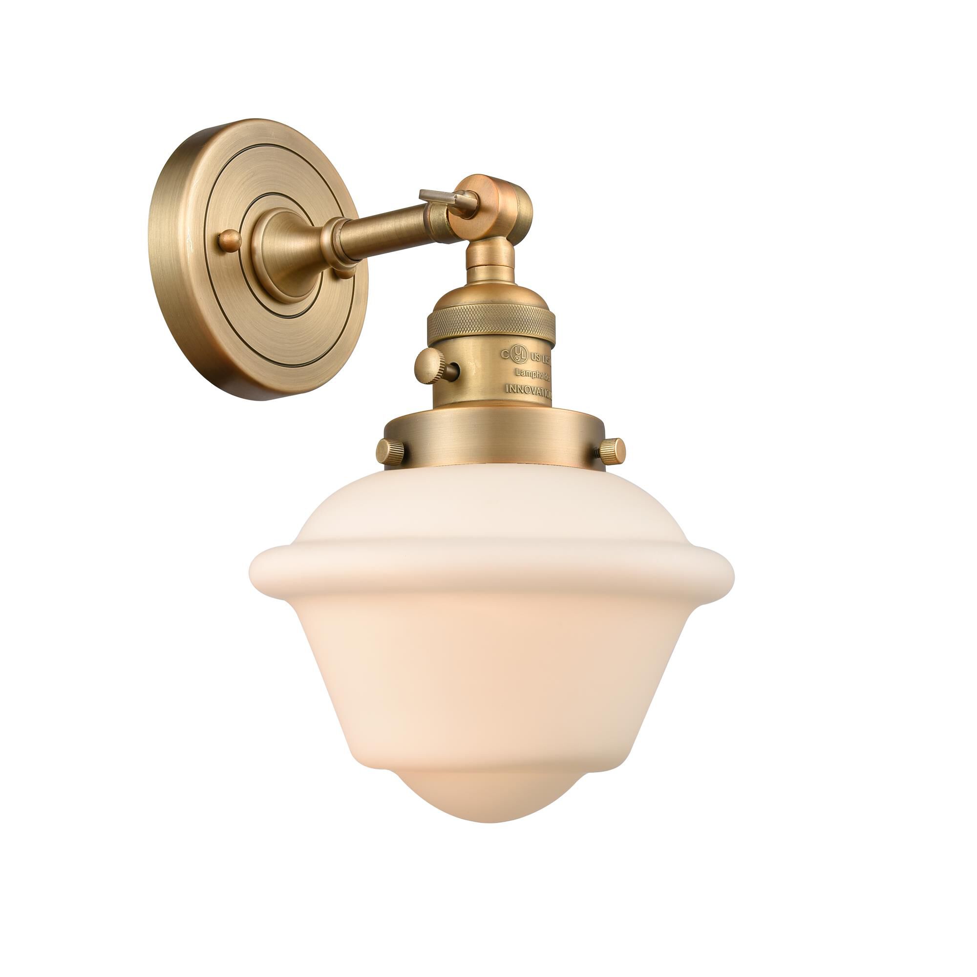 Shown in Brushed Brass finish and Matte White Cased glass and Switch on Socket accent