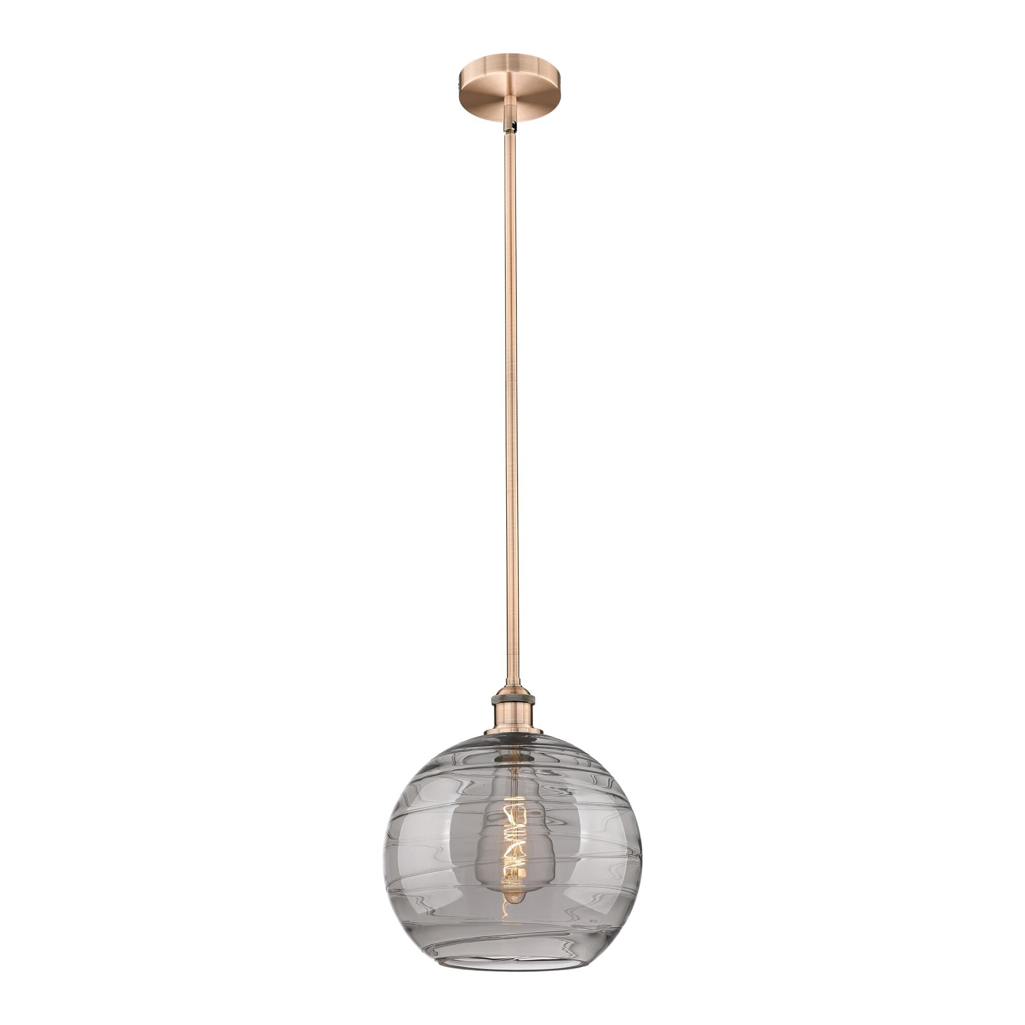 Shown in Antique Copper finish and Light Smoke Deco Swirl glass