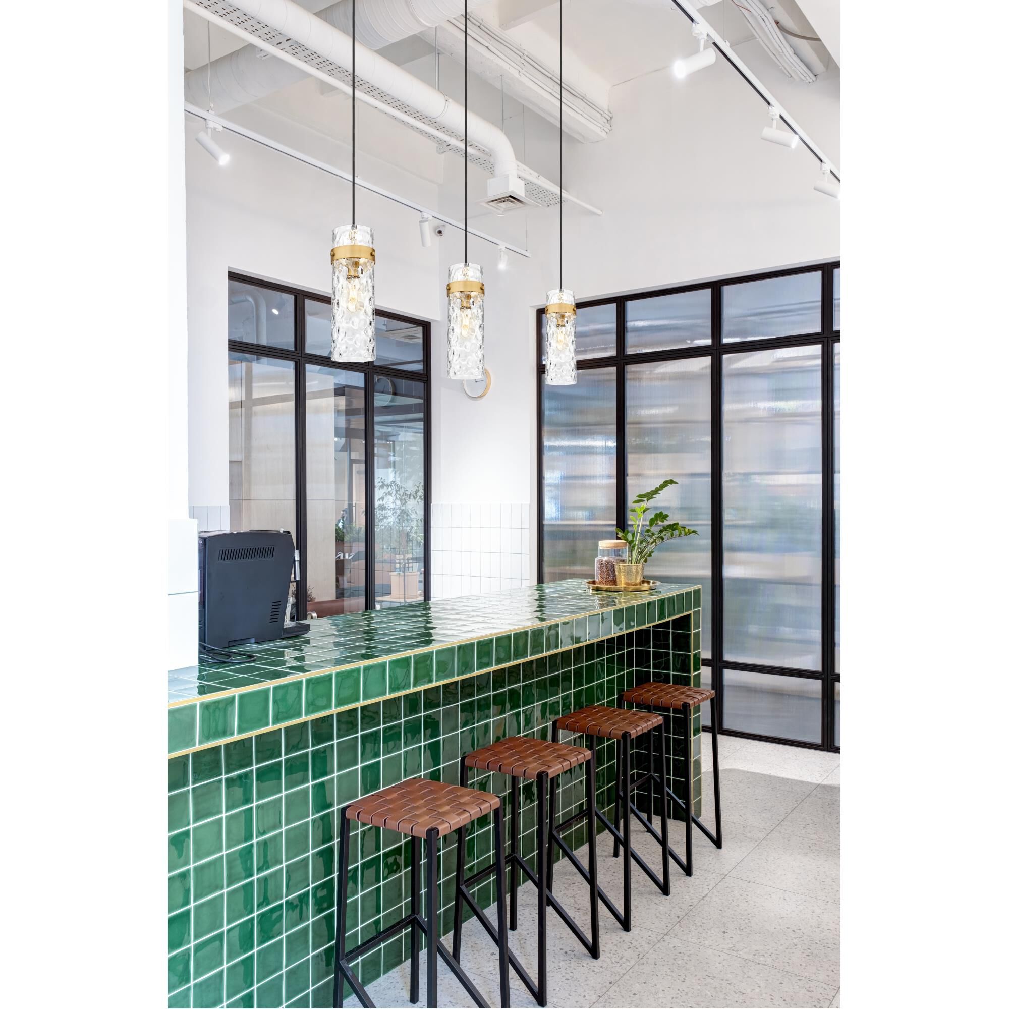 Shown in Rubbed Brass finish and Clear Water glass and Clear Water shade