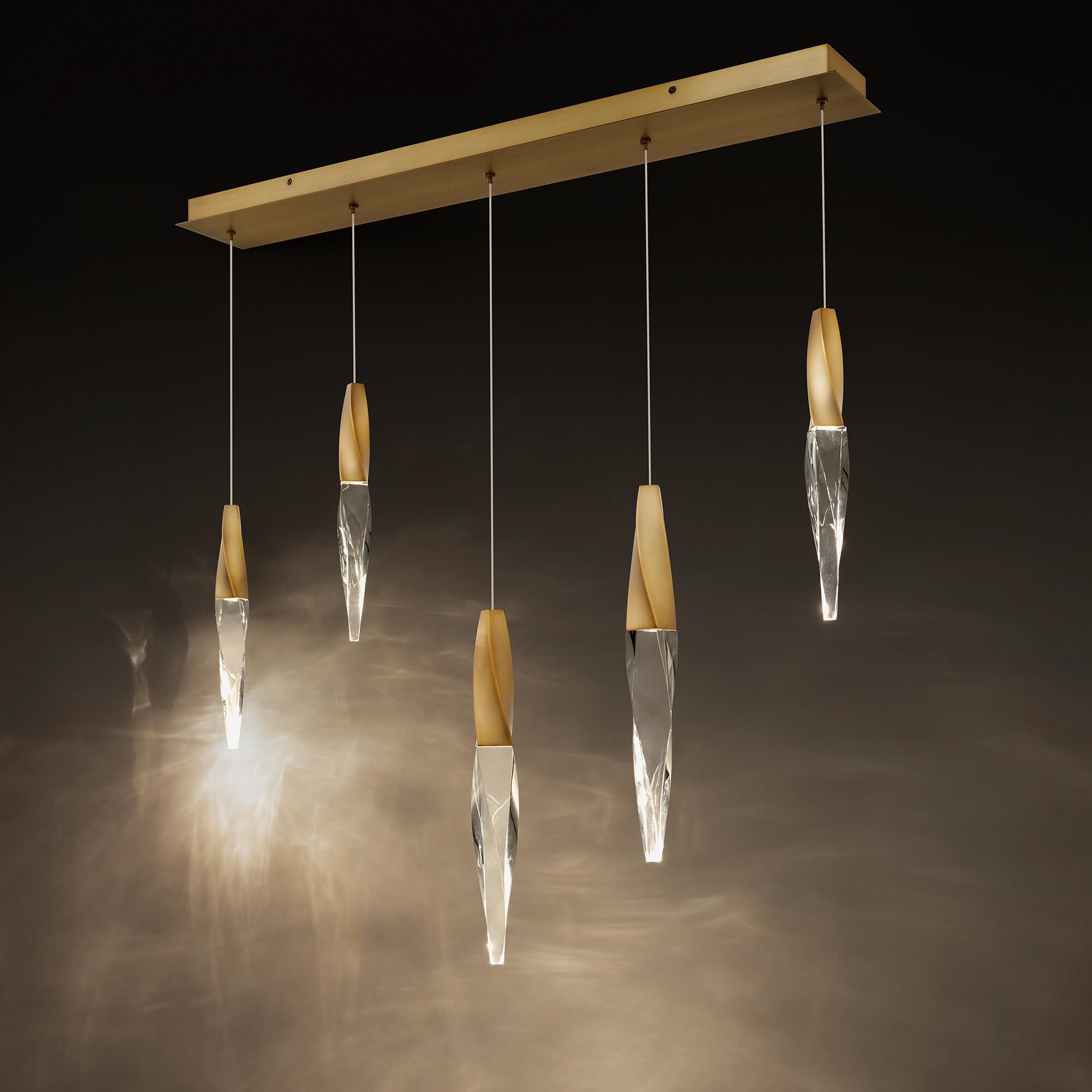 Shown in Aged Brass finish and Optic Crystal crystal