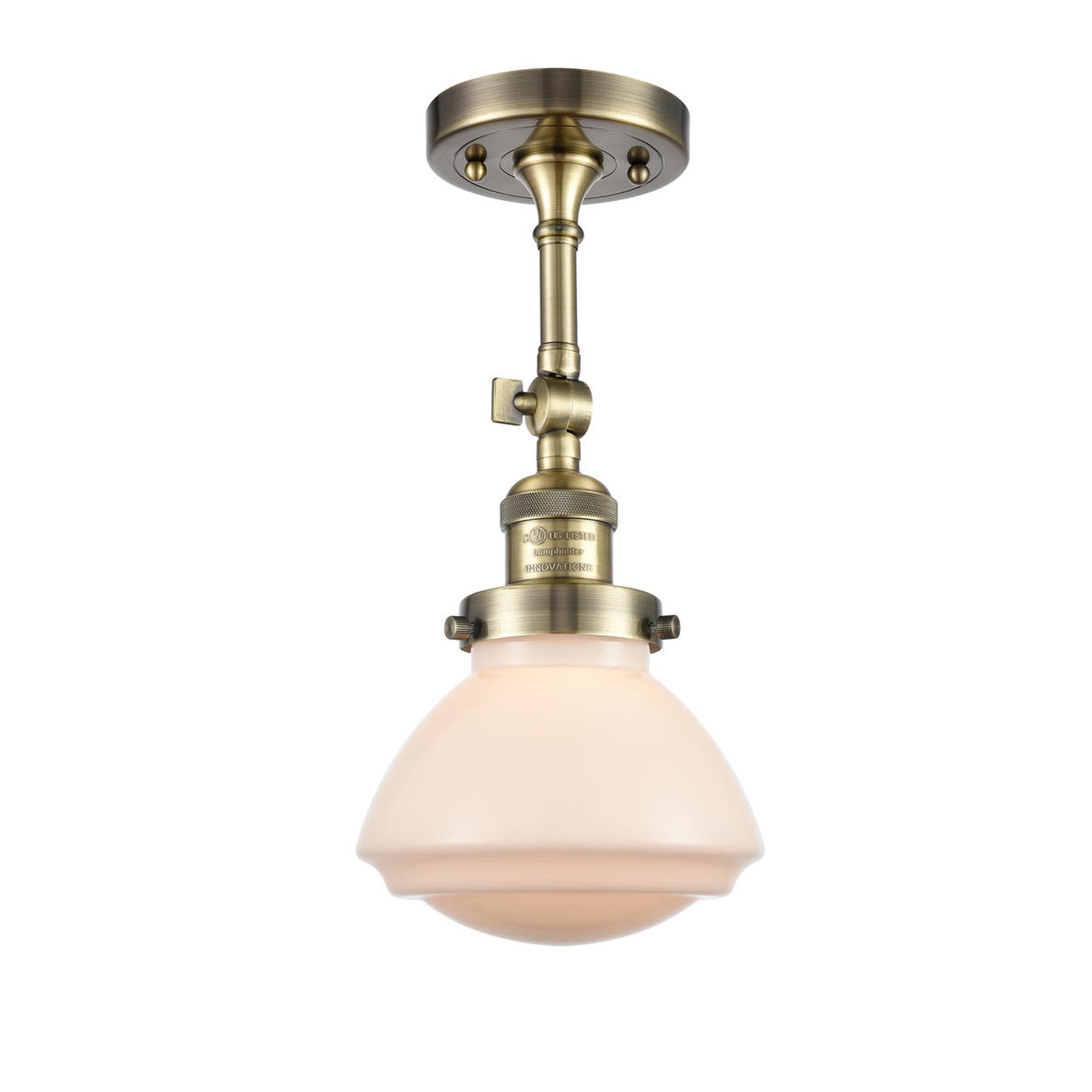 Shown in Antique Brass finish and Bell glass and Glass shade and Bulb Tint - Amber accent