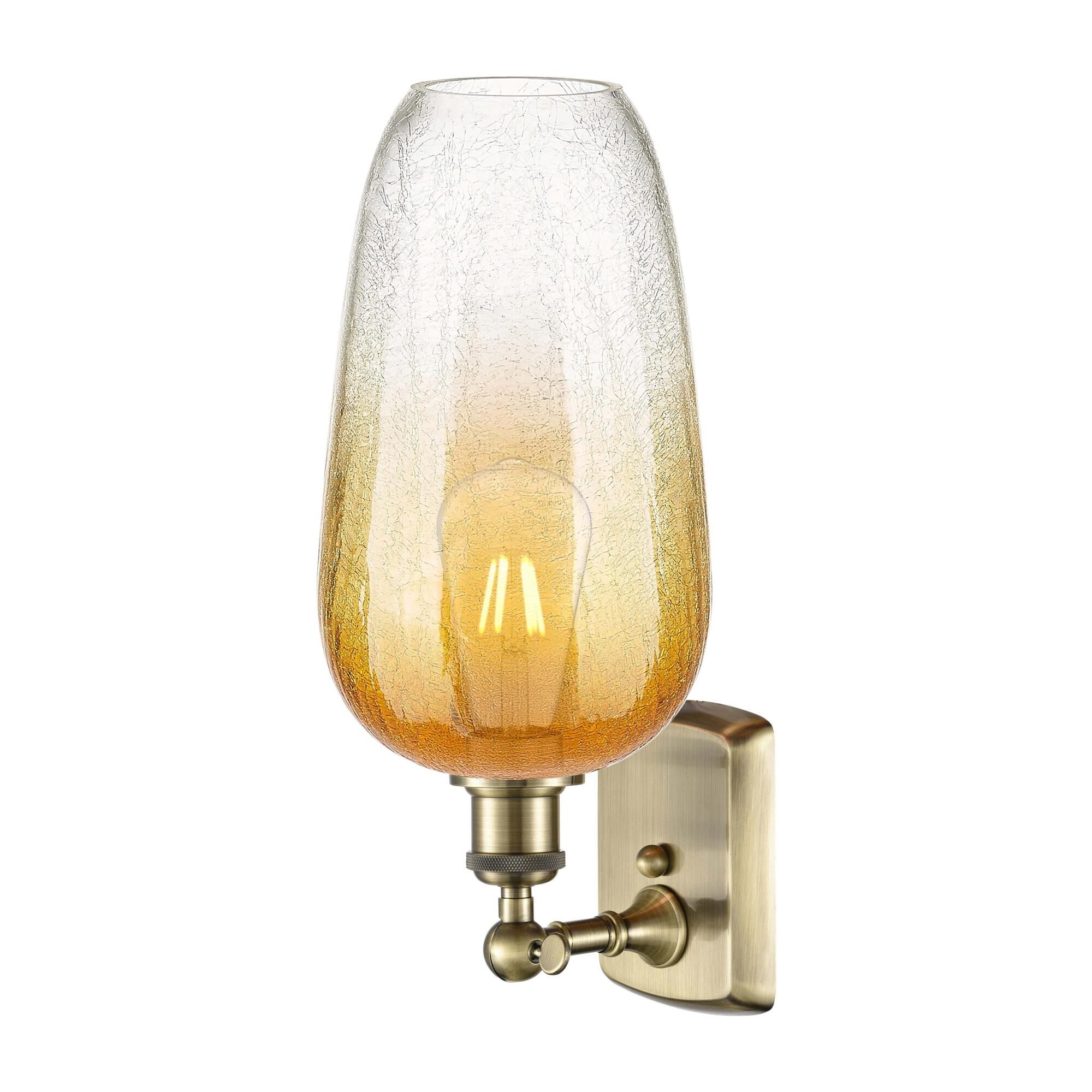 Shown in Antique Brass finish and Amber glass