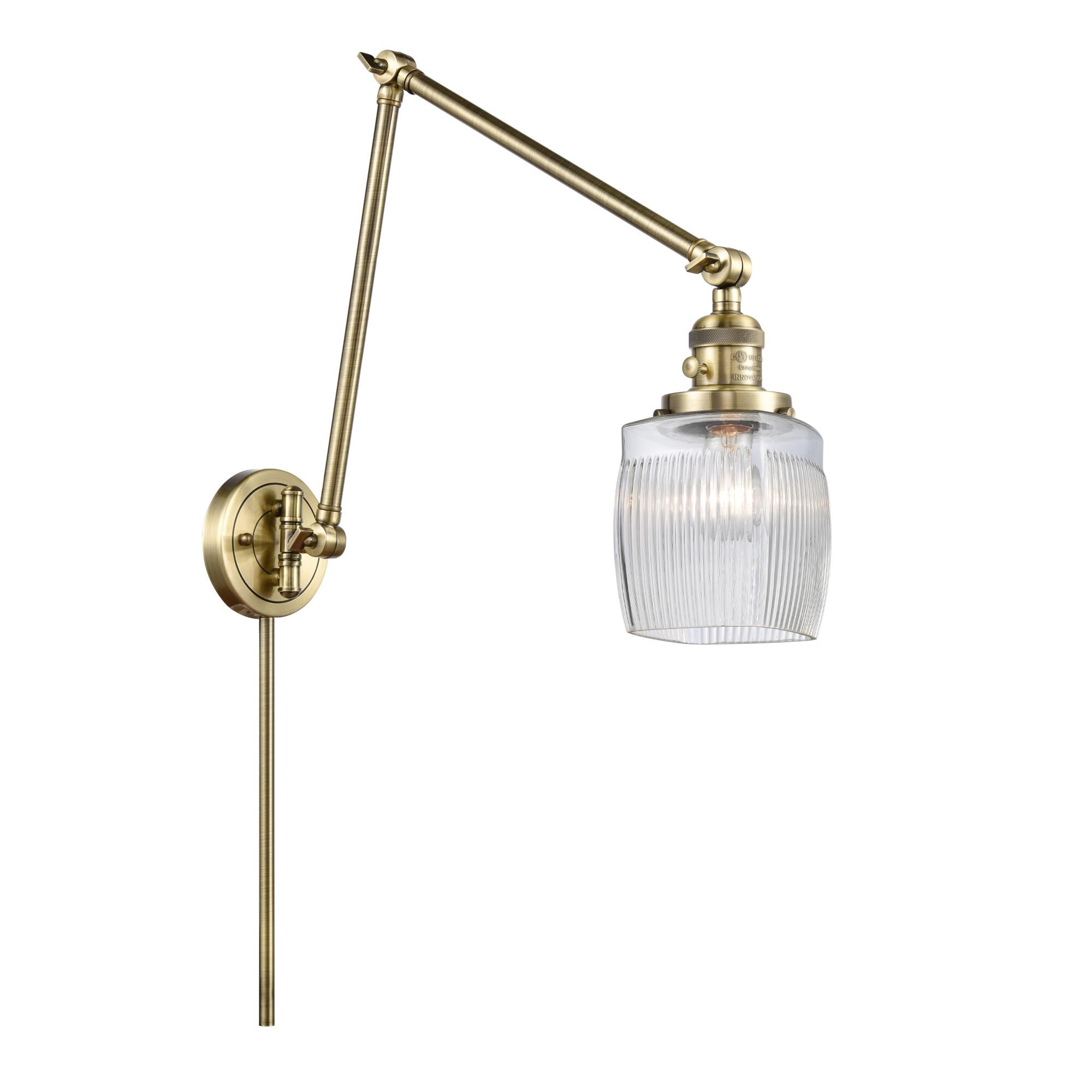 Shown in Antique Brass finish and Thick Clear Halophane Colton glass