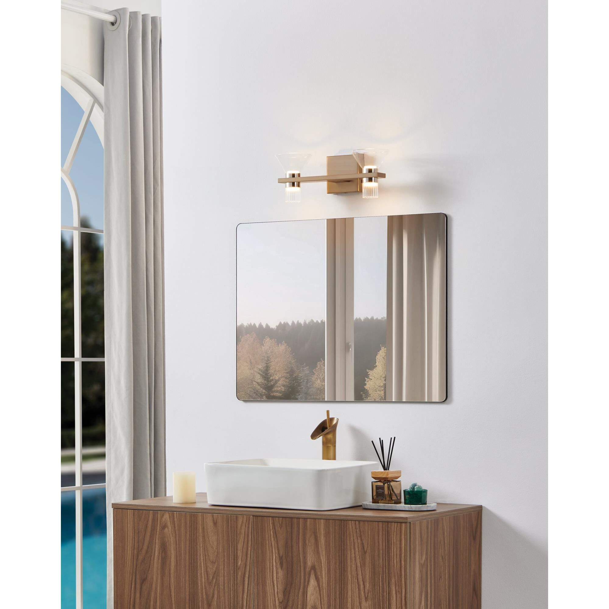 Shown in Champagne Gold finish and Clear, Clear Ribbed glass