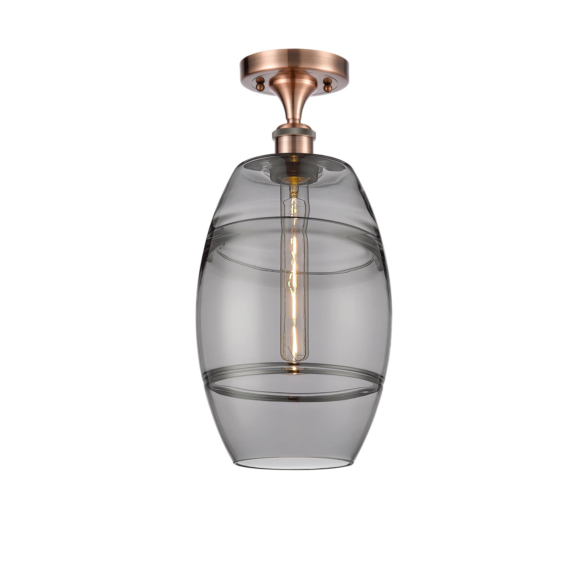 Shown in Antique Copper finish and Light Smoke glass