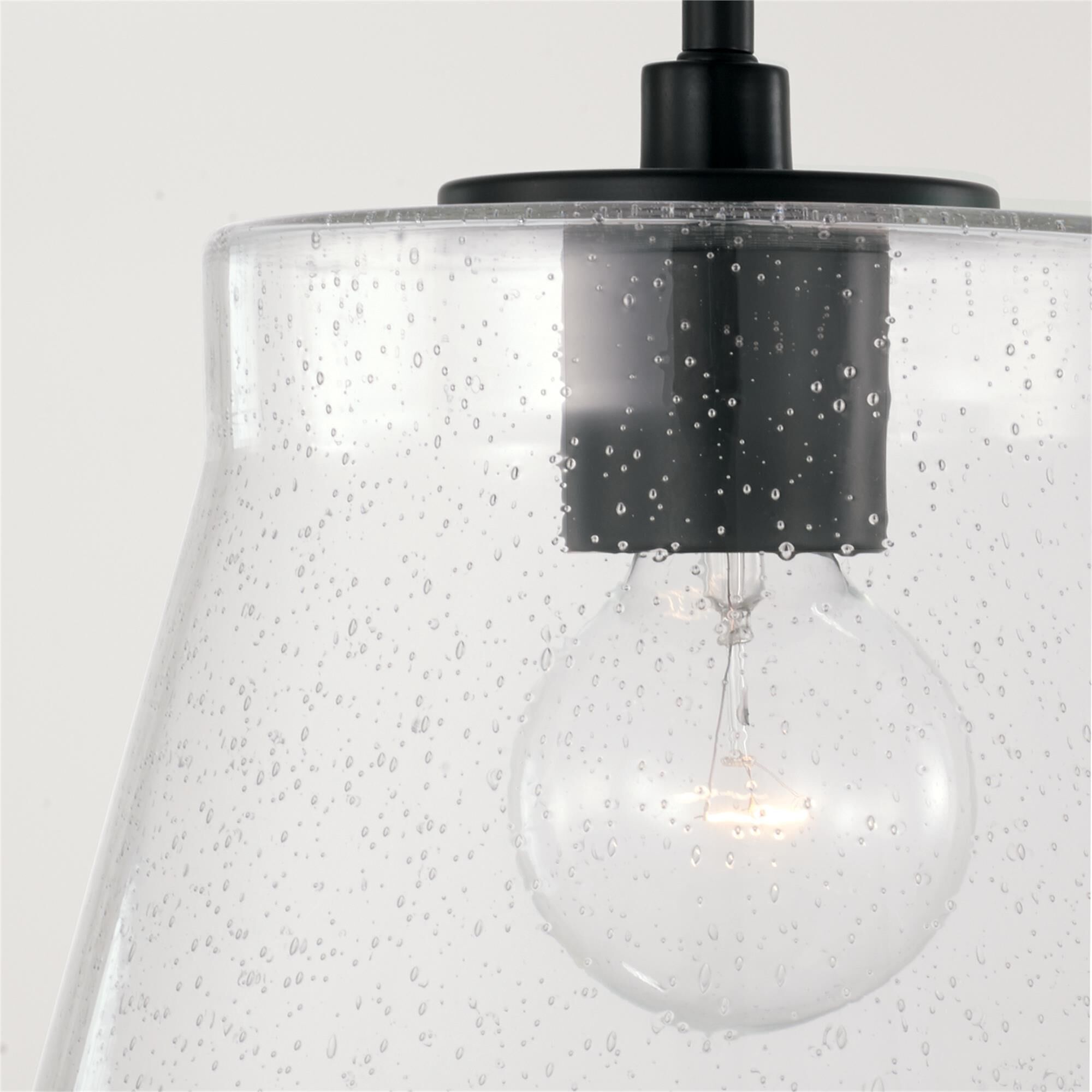 Shown in Matte Black finish and Clear Seeded glass