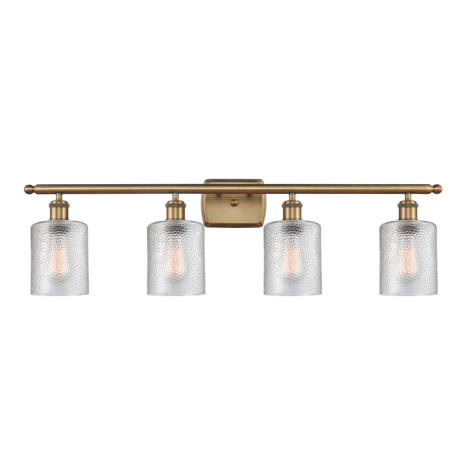 Shown in Brushed Brass finish and Drum glass and Glass shade