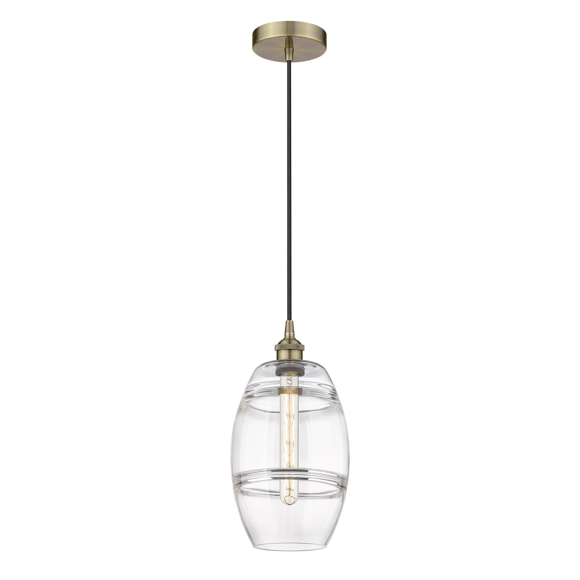 Shown in Antique Brass finish and Clear glass