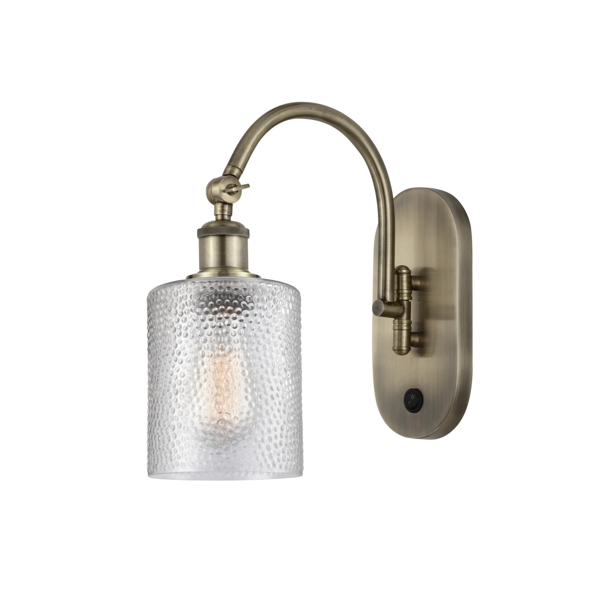 Shown in Antique Brass finish and Clear glass