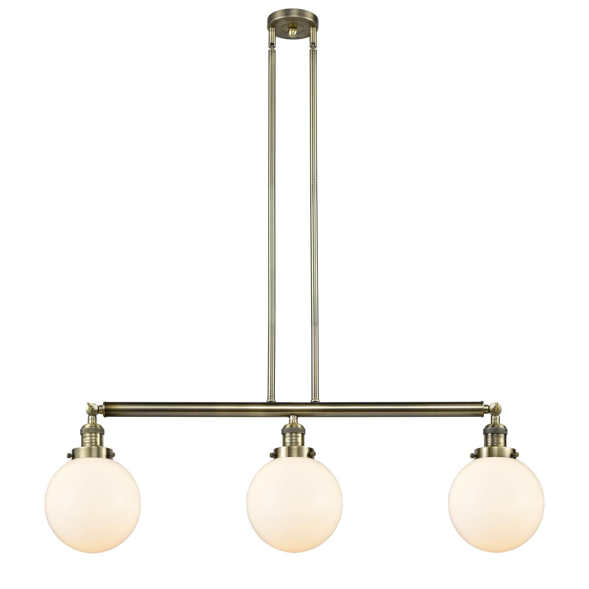 Shown in Antique Brass finish and Matte White Cased Beacon glass