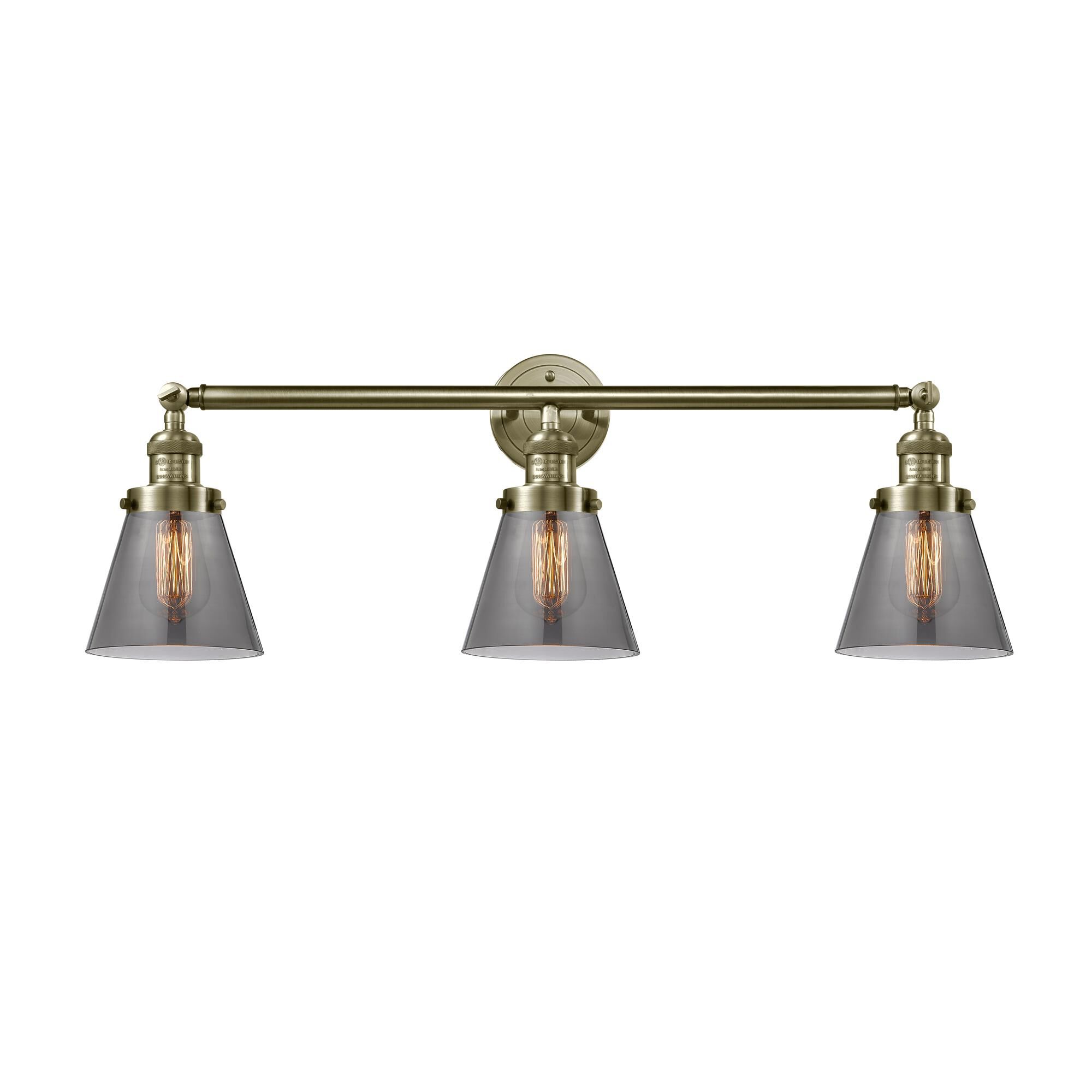 Shown in Antique Brass finish and Smoked glass