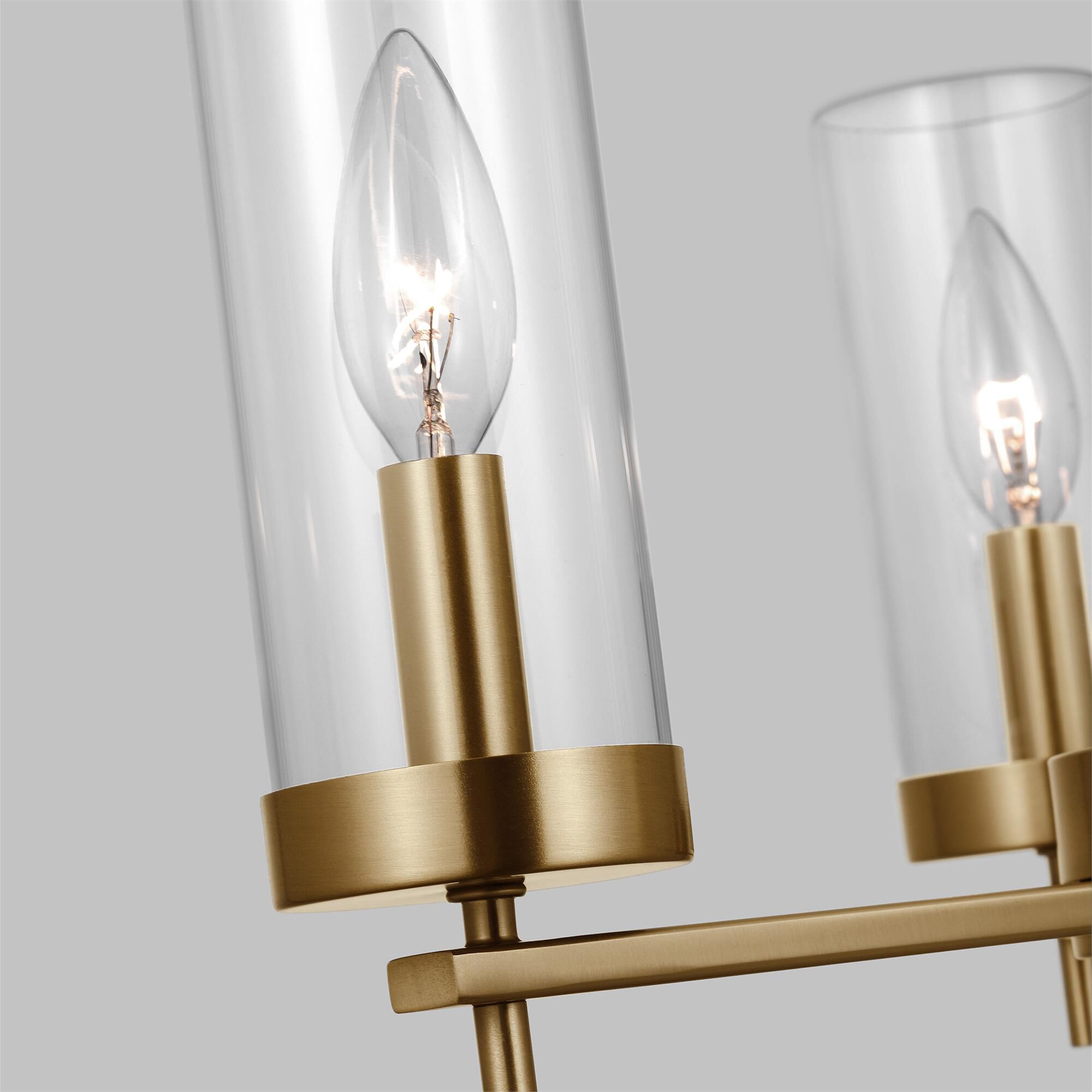 Shown in Satin Brass finish and Clear Glass s shade