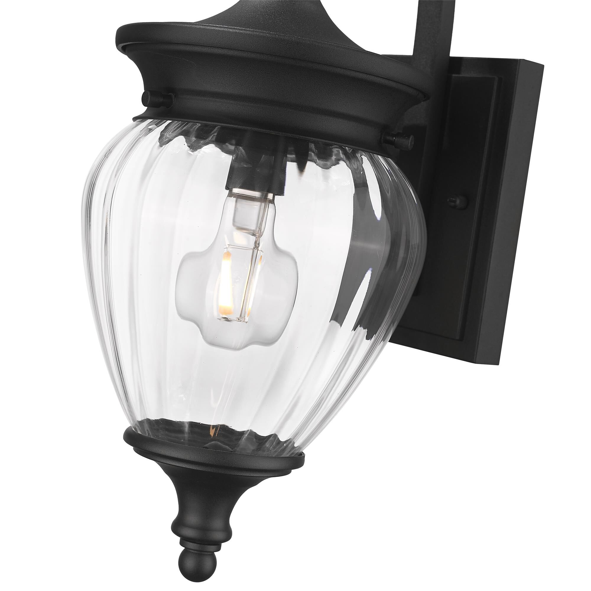 Shown in Black finish and Clear Ribbed glass and Clear Ribbed shade