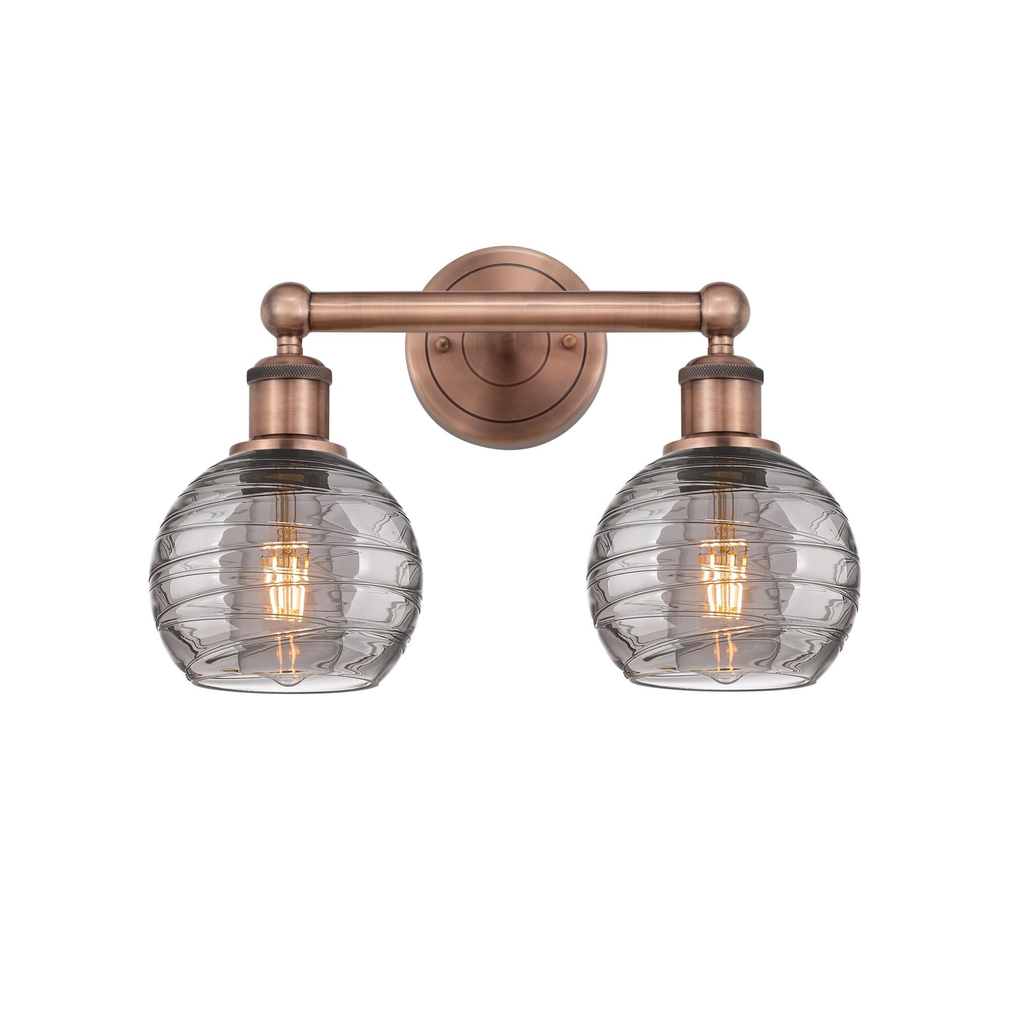 Shown in Antique Copper finish and Light Smoke Deco Swirl glass