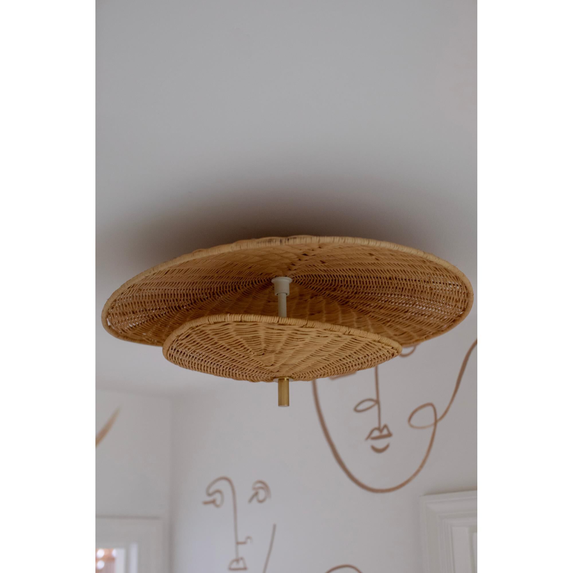 Shown in Aged Brass finish and Natural Woven shade