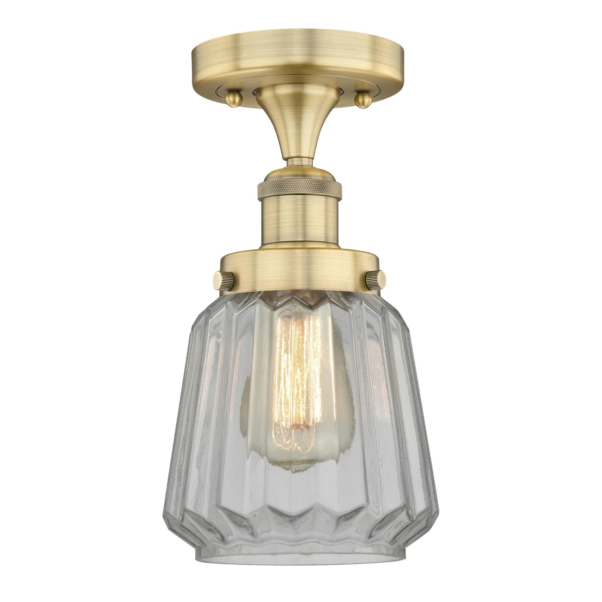 Shown in Brushed Brass finish and Clear glass