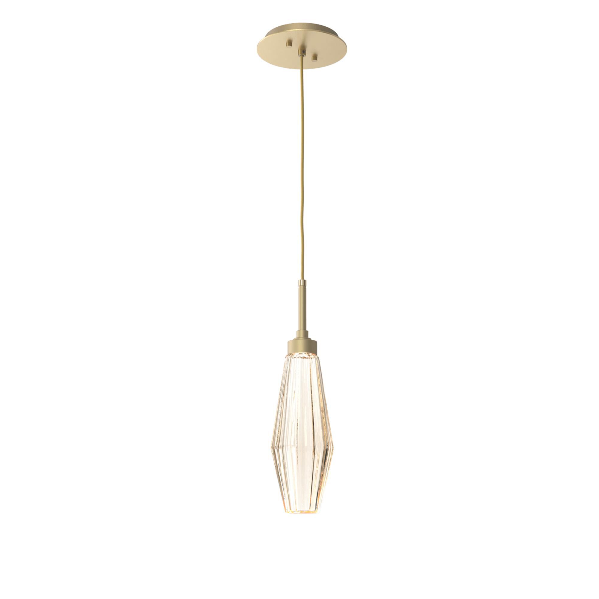 Shown in Gilded Brass finish and Optic Rib Amber glass