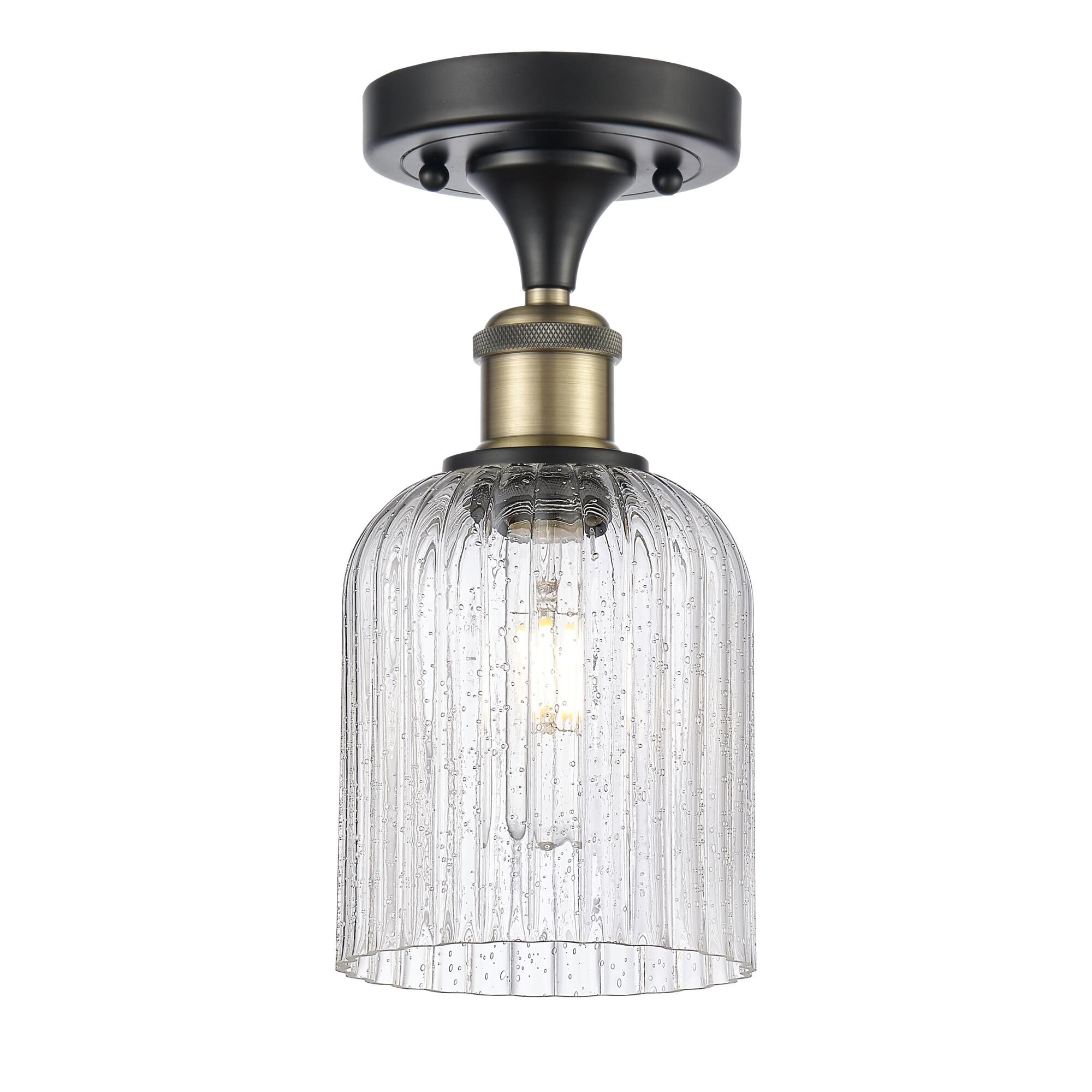 Shown in Black Antique Brass finish and Seedy shade