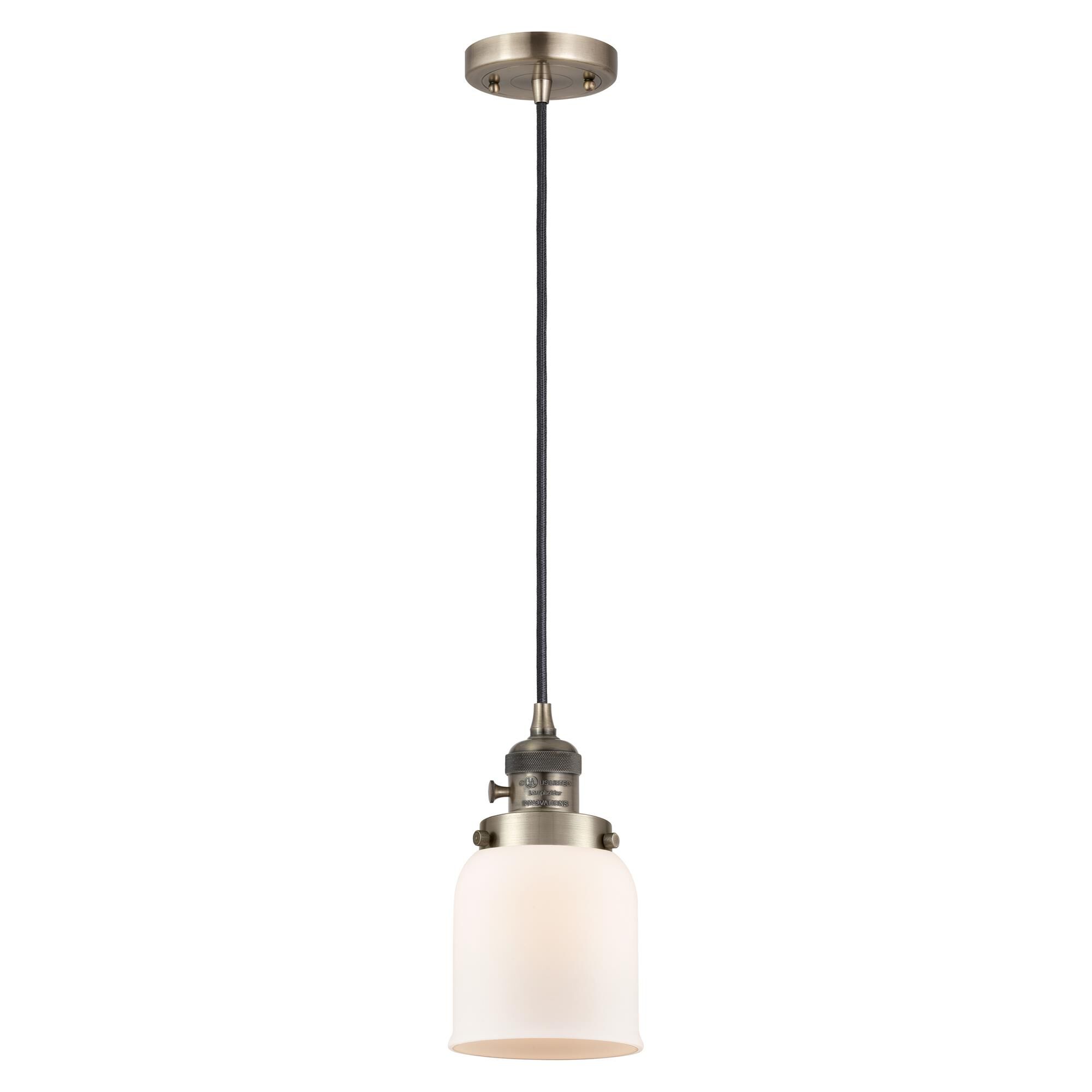 Shown in Antique Brass finish and Matte White glass