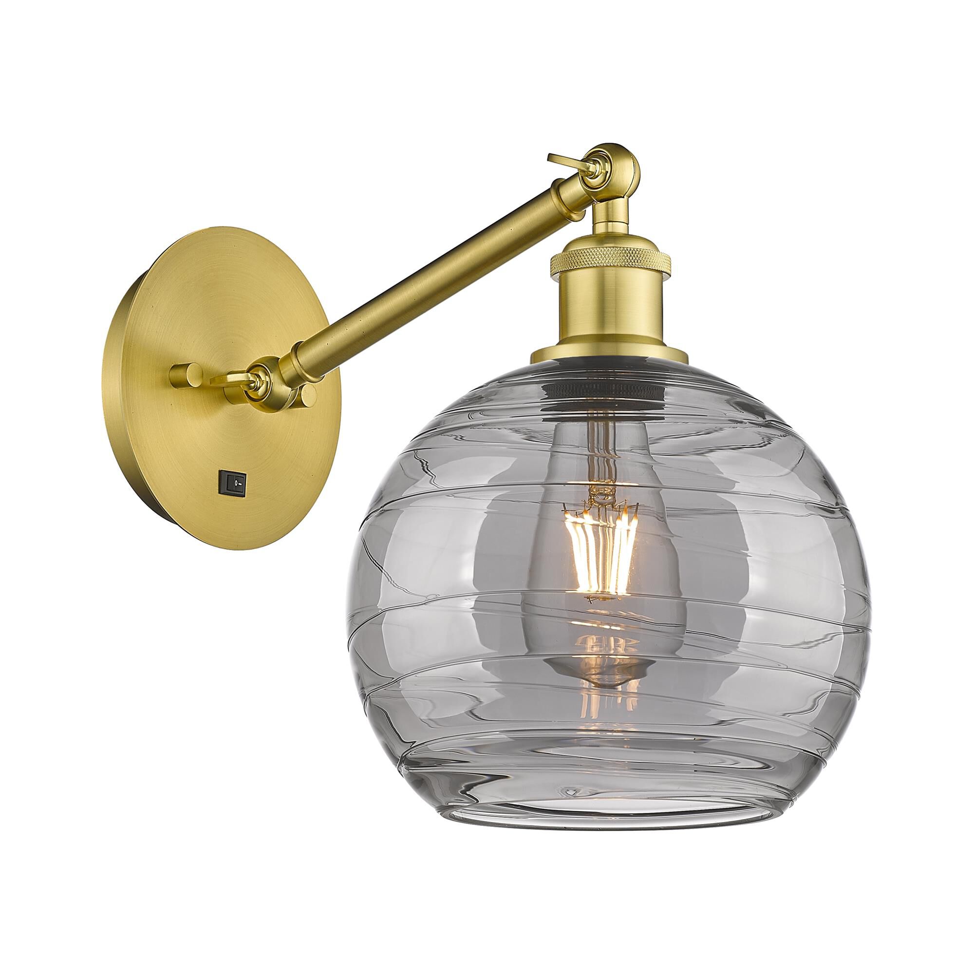 Shown in Satin Gold finish and Light Smoke Deco Swirl glass