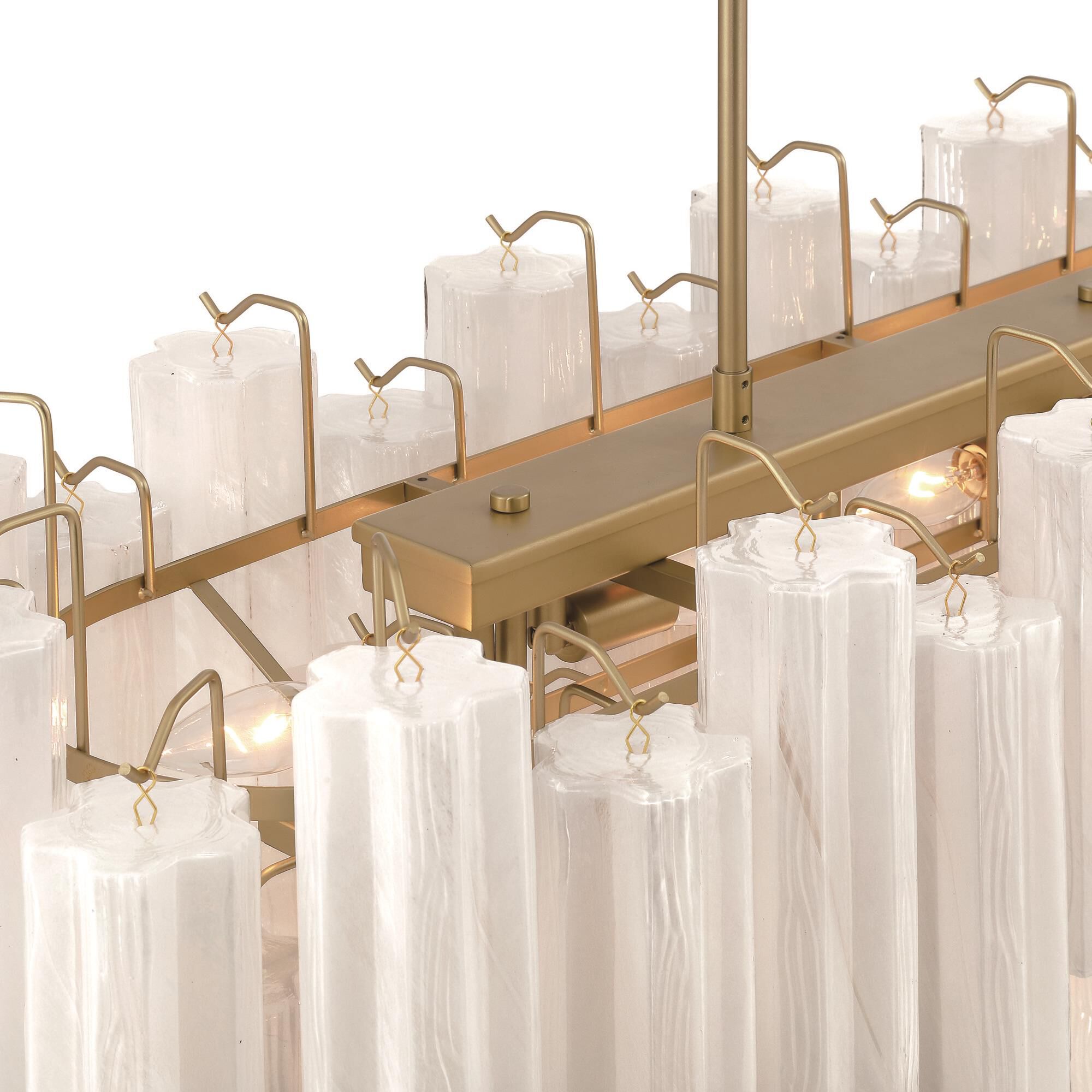 Shown in Brushed Brass finish and Wispy White Tronchi glass