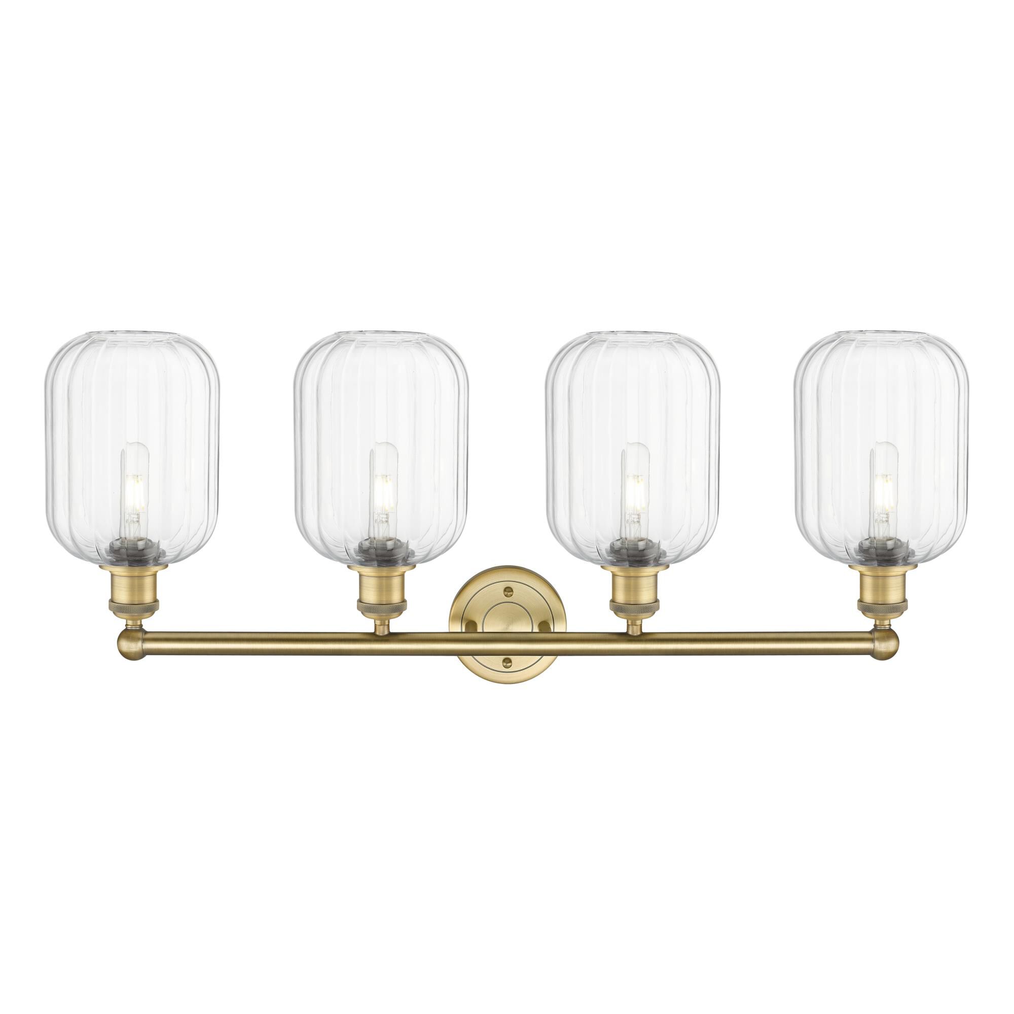 Shown in Brushed Brass finish and Clear glass