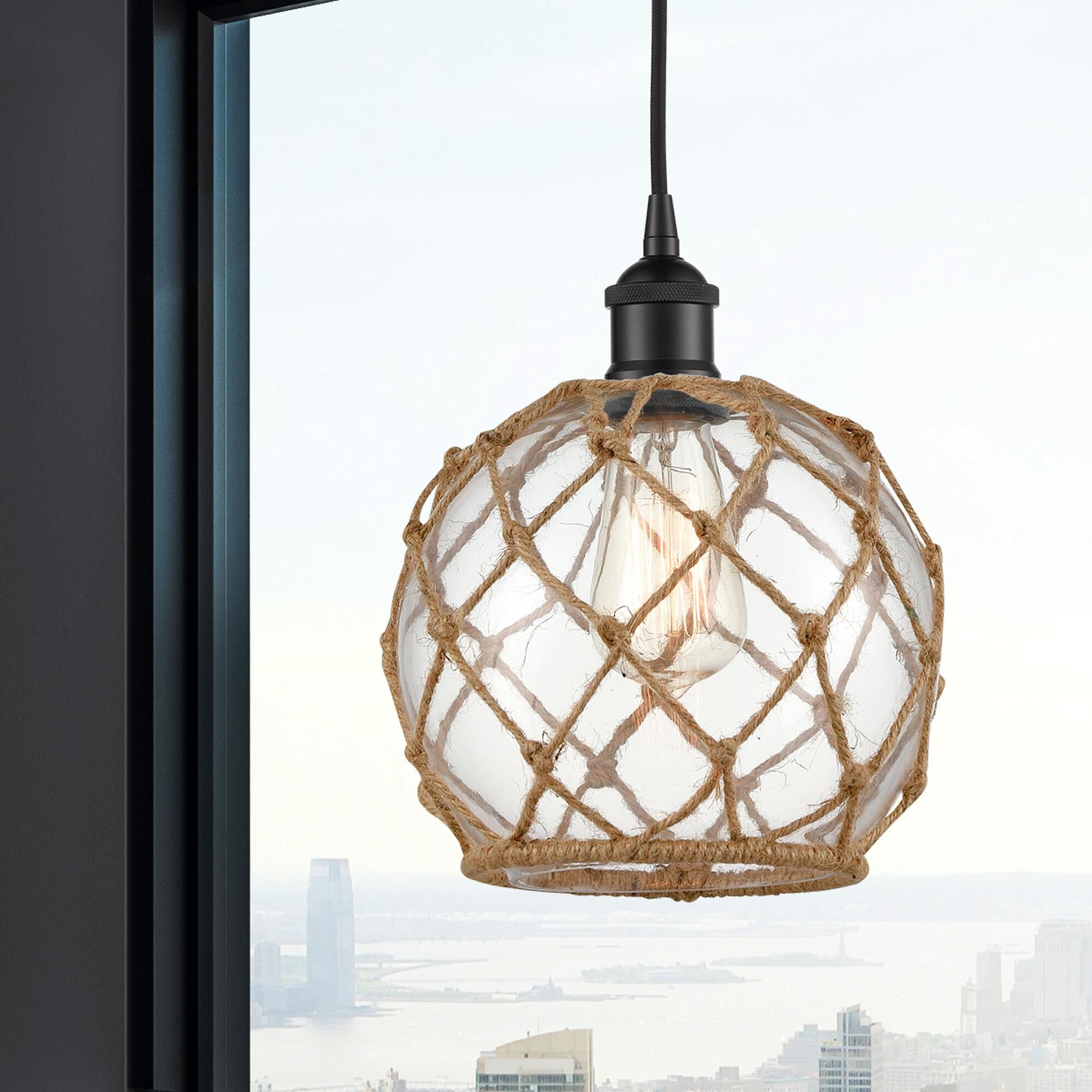 Shown in Matte Black finish and Clear Farmhouse With Brown Rope glass