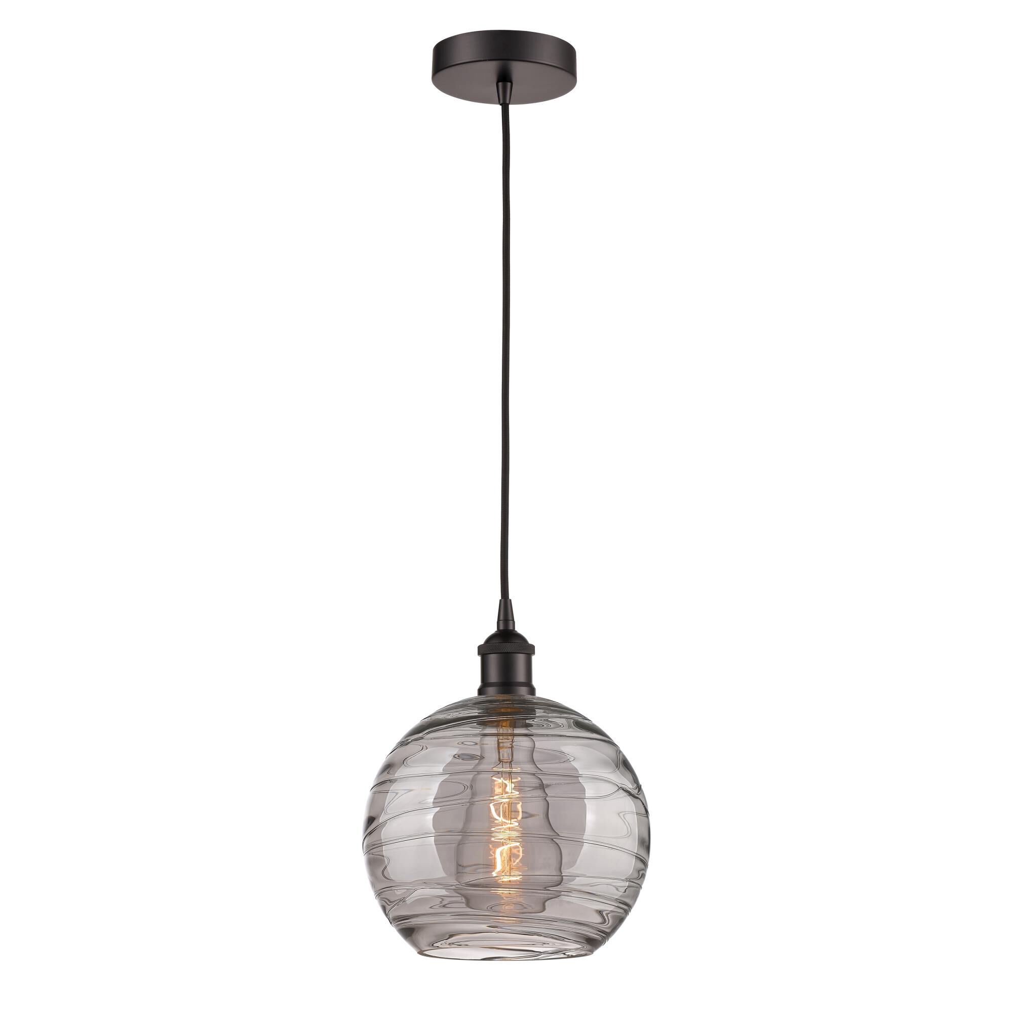 Shown in Oil Rubbed Bronze finish and Light Smoke Deco Swirl glass